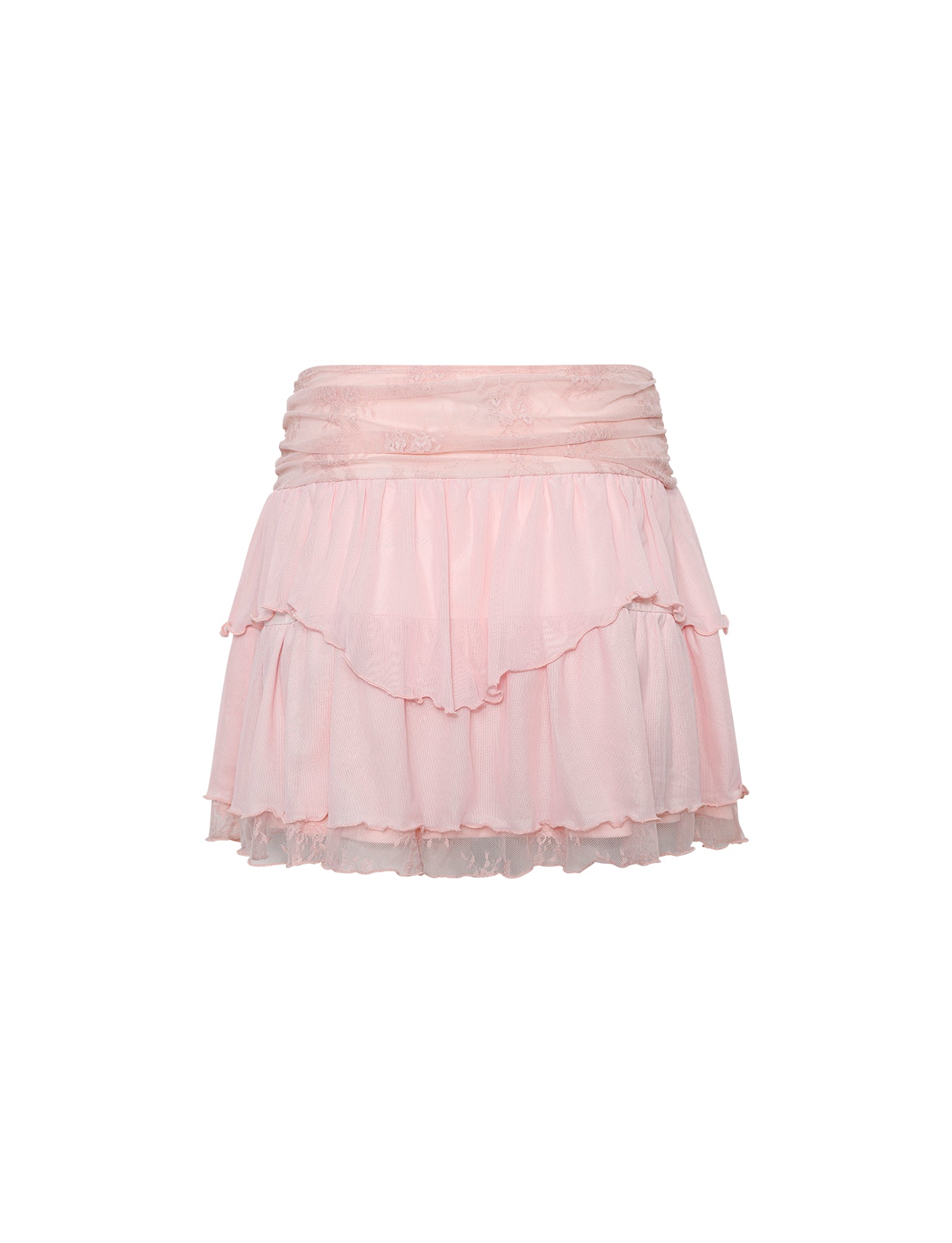 The HARPER MINI SKIRT in pastel baby pink from TIGERMIST features a light pink, tiered design with ruffles and a lace waistband. This mini skirt has multiple layers that provide a flouncy, feminine look. The semi-sheer fabric is adorned with delicate floral embroidery and has a soft, flowy texture.