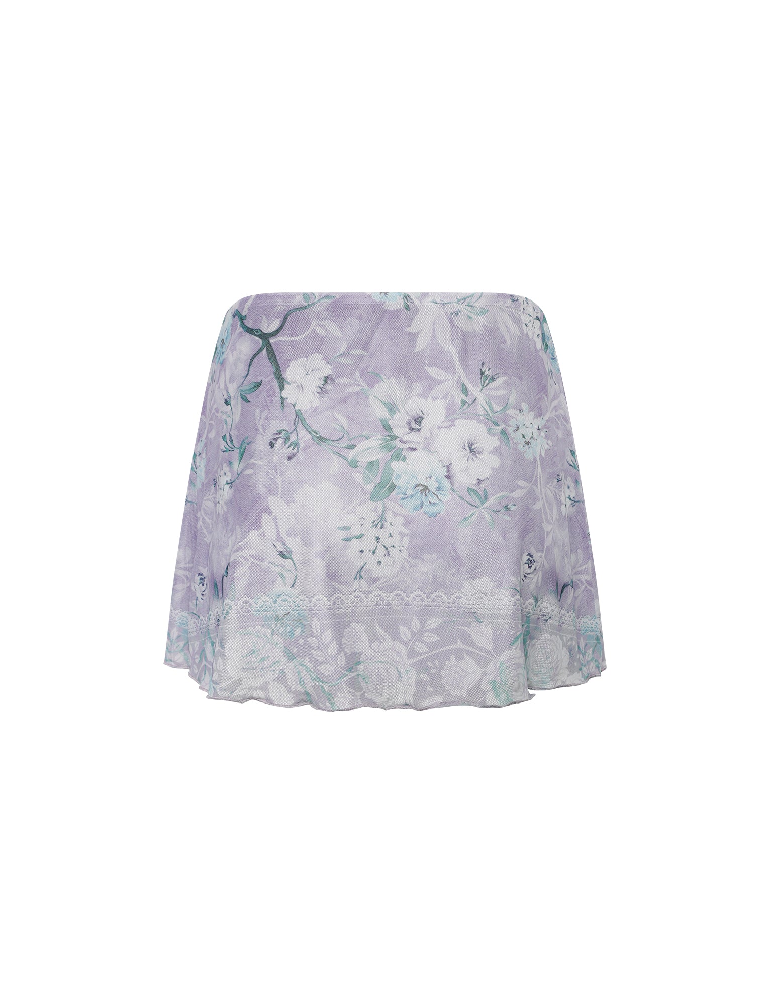The AMARAN MINI SKIRT - PURPLE : FLORAL BOARDERS from the TIGERMIST collection is a light purple skirt adorned with a delicate white and green flower pattern. It features a lacy trim at the hem, adding an elegant touch, and is made from light and airy fabric, perfect for warm weather.