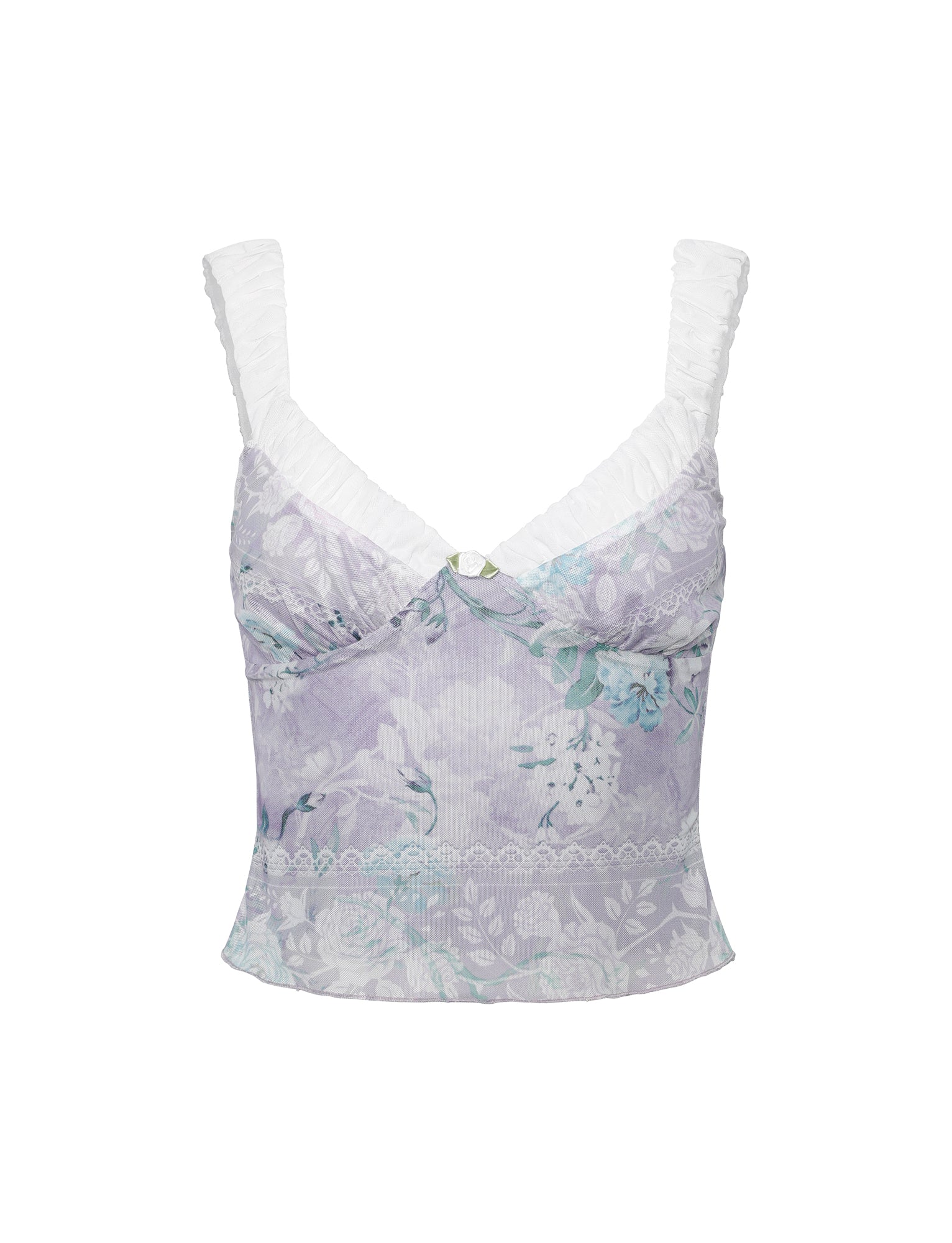 The AMARAN TOP - PURPLE : FLORAL BOARDERS from TIGERMIST is a pastel purple floral bustier crop top featuring a sweetheart neckline and white ruffled straps. It showcases intricate floral patterns in shades of blue, green, and white, with lace detailing at the hem. The fabric has a delicate, elegant texture.