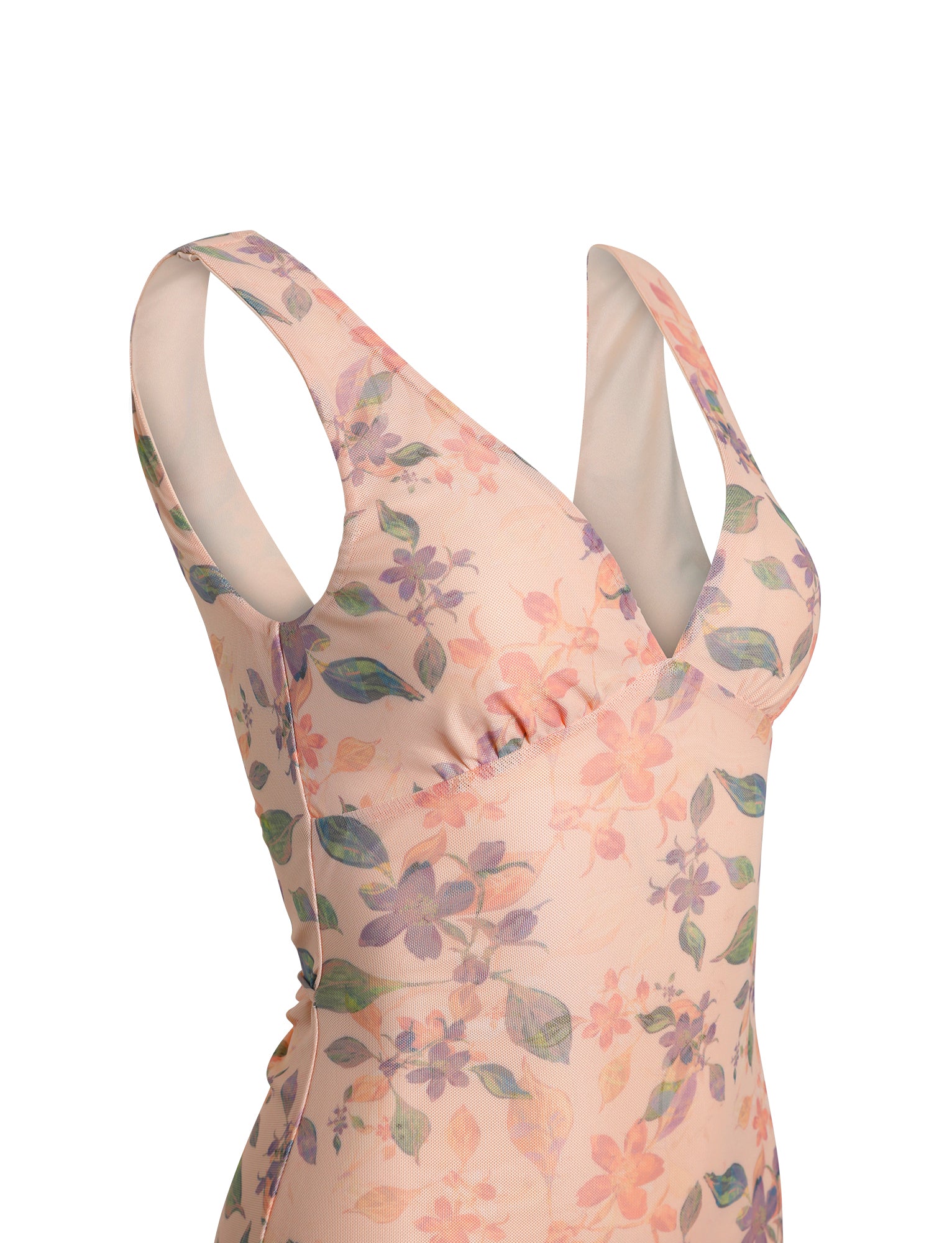 Introducing the CYRUS DRESS - ORANGE : PEACH WATERCOLOUR FLORAL from TIGERMIST, a delightful dress featuring wide shoulder straps and a deep V-neck. This stunning piece showcases an intricately designed floral pattern in a pastel palette of pinks, purples, and greens. The light and airy material makes it the perfect choice for spring or summer wear.