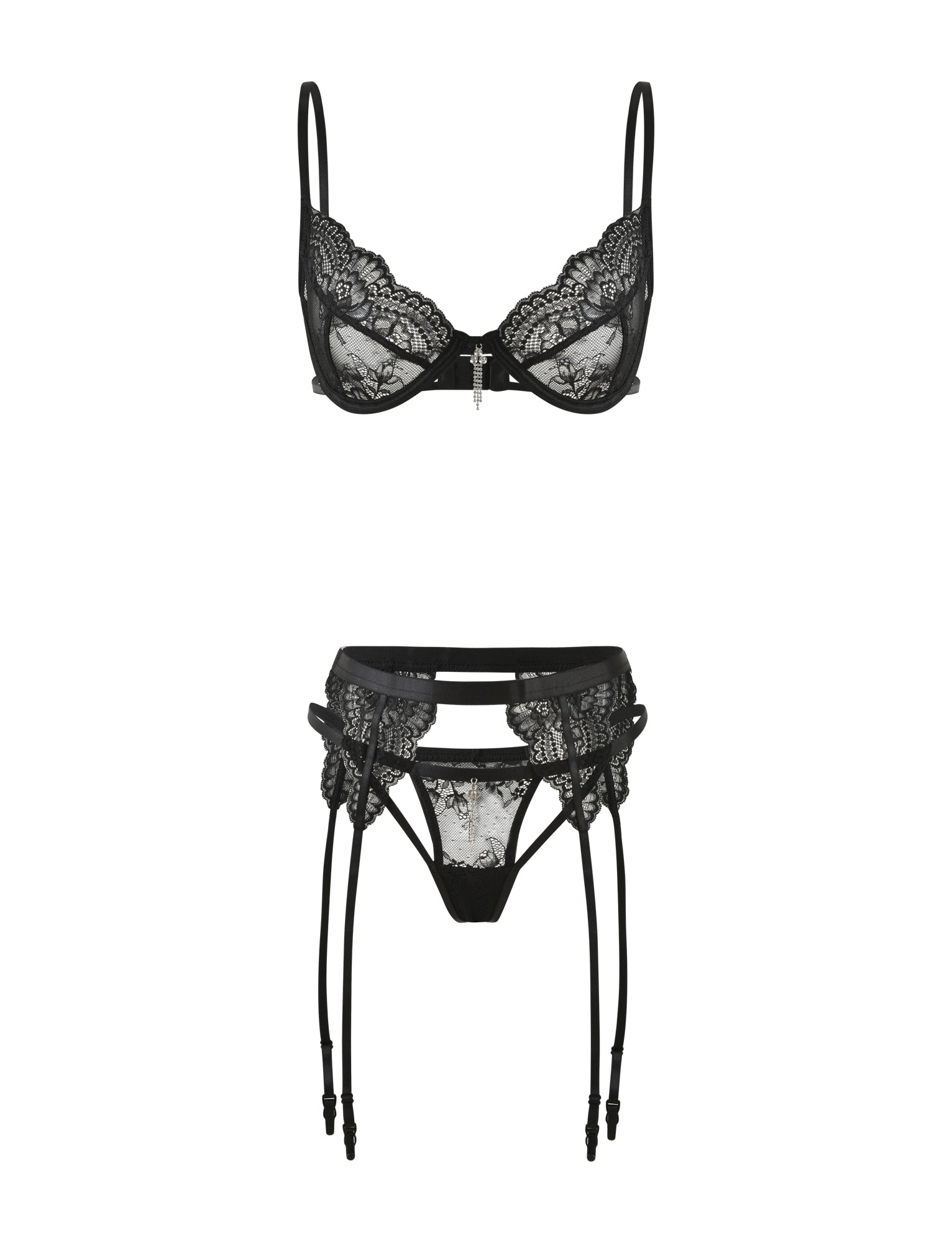 The JORDAN SET - BLACK by TIGERMIST showcases an elegant black lace intimate set with a delicate underwire bra with thin straps, paired with a matching garter belt featuring suspenders. Both pieces are adorned with intricate lace detailing and a central decorative element.