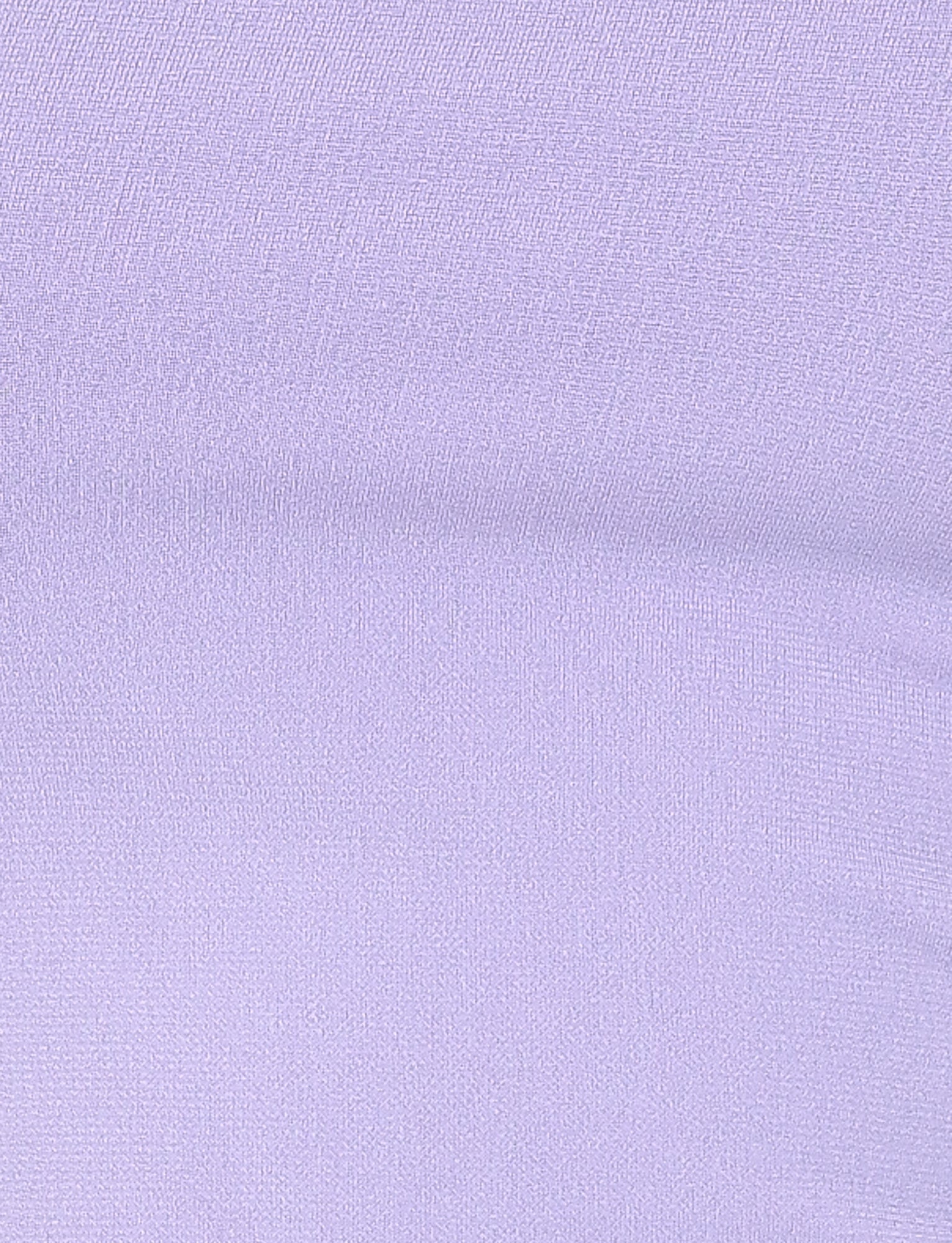 This close-up of the lilac textured fabric, perfect for the XENIA MINI DRESS - PURPLE by TIGERMIST, features a soft and uniform look. The subtle weave pattern provides a gentle, tactile surface that is ideal for achieving a seamless bodycon fit.