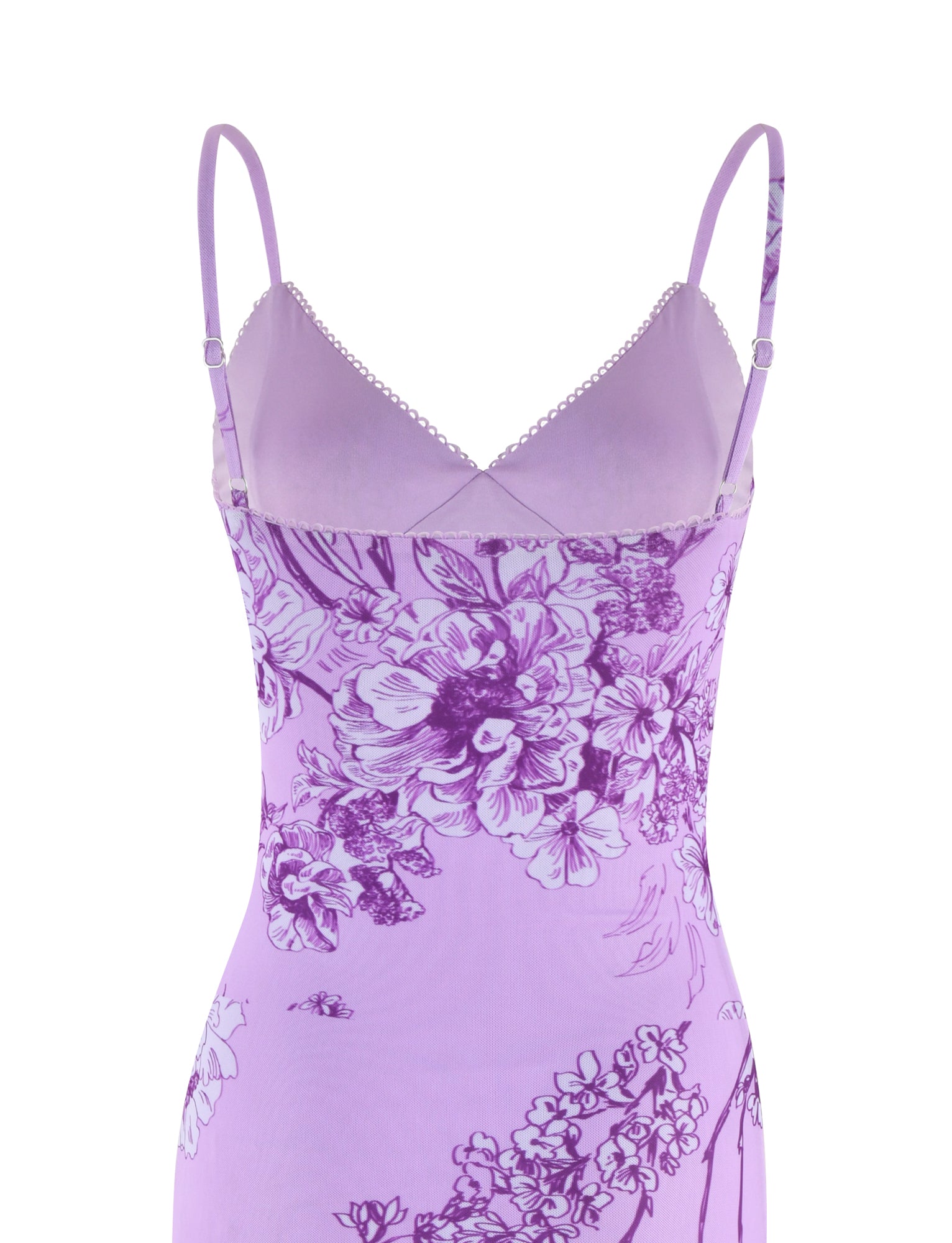 The TIGERMIST Julianna Dress is a lilac slip dress with thin straps and a darker-toned purple ceramic floral print. It features an elegant lace trim along the bustline, enhancing its delicate design.