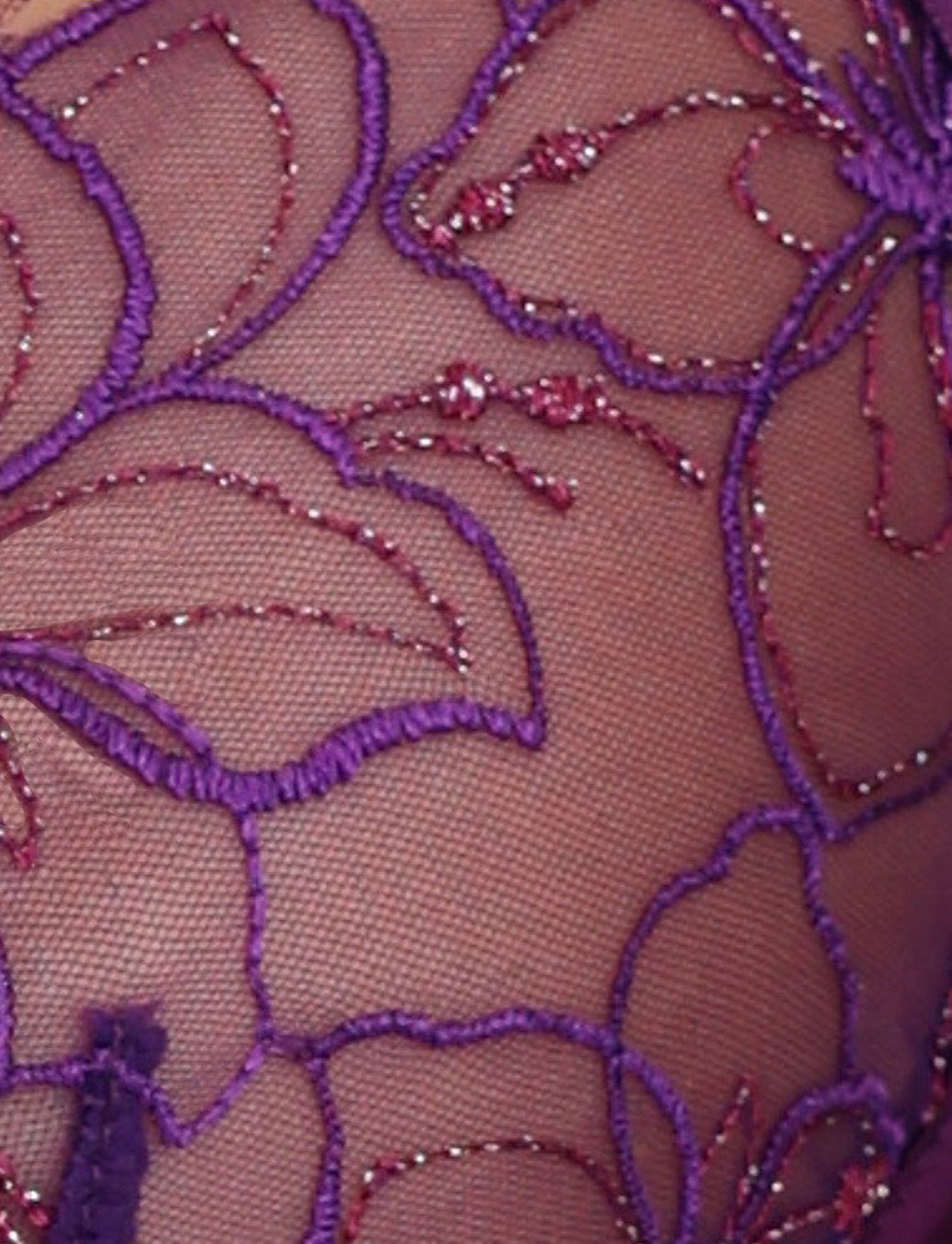 Close-up view of LAURA SET - PURPLE : LAVENDER by TIGERMIST, showcasing purple and maroon floral embroidery on a sheer, beige background. The floral pattern features intricate detailing with a mix of thread colors, creating a delicate and elegant design reminiscent of luxurious floral lurex lace.