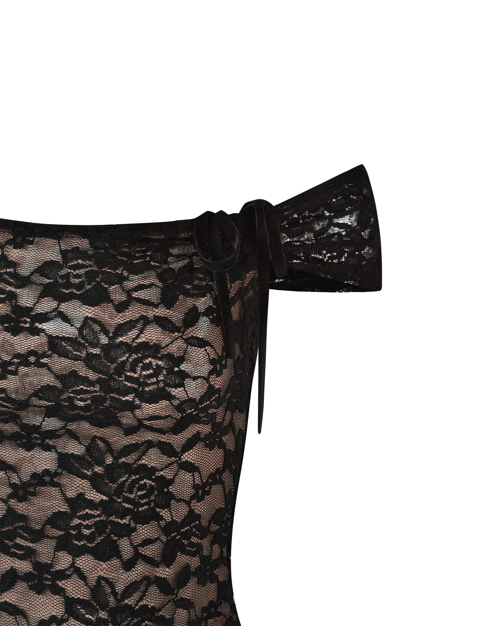 A close-up of the CYD TOP - BLACK by TIGERMIST reveals its intricate floral lace patterns. The top is adorned with a large, elegant bow detail on the shoulder, adding a touch of sophistication. The see-through black lace allows a glimpse of a beige background underneath, showcasing Tiger Mist's signature style.