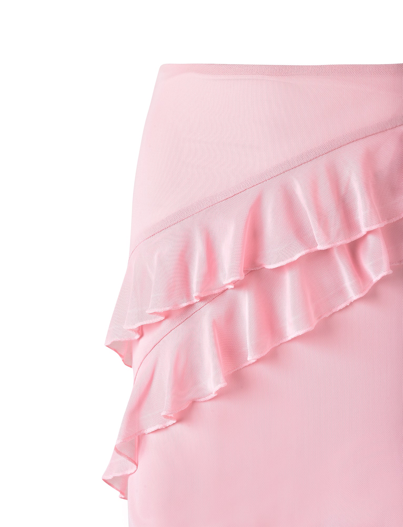 A close-up of the Baby Pink Stormi Skirt from Tigermist featuring a tiered ruffle design. The garment boasts delicate, flowing fabric with diagonal layers of ruffles, creating a soft and romantic appearance.