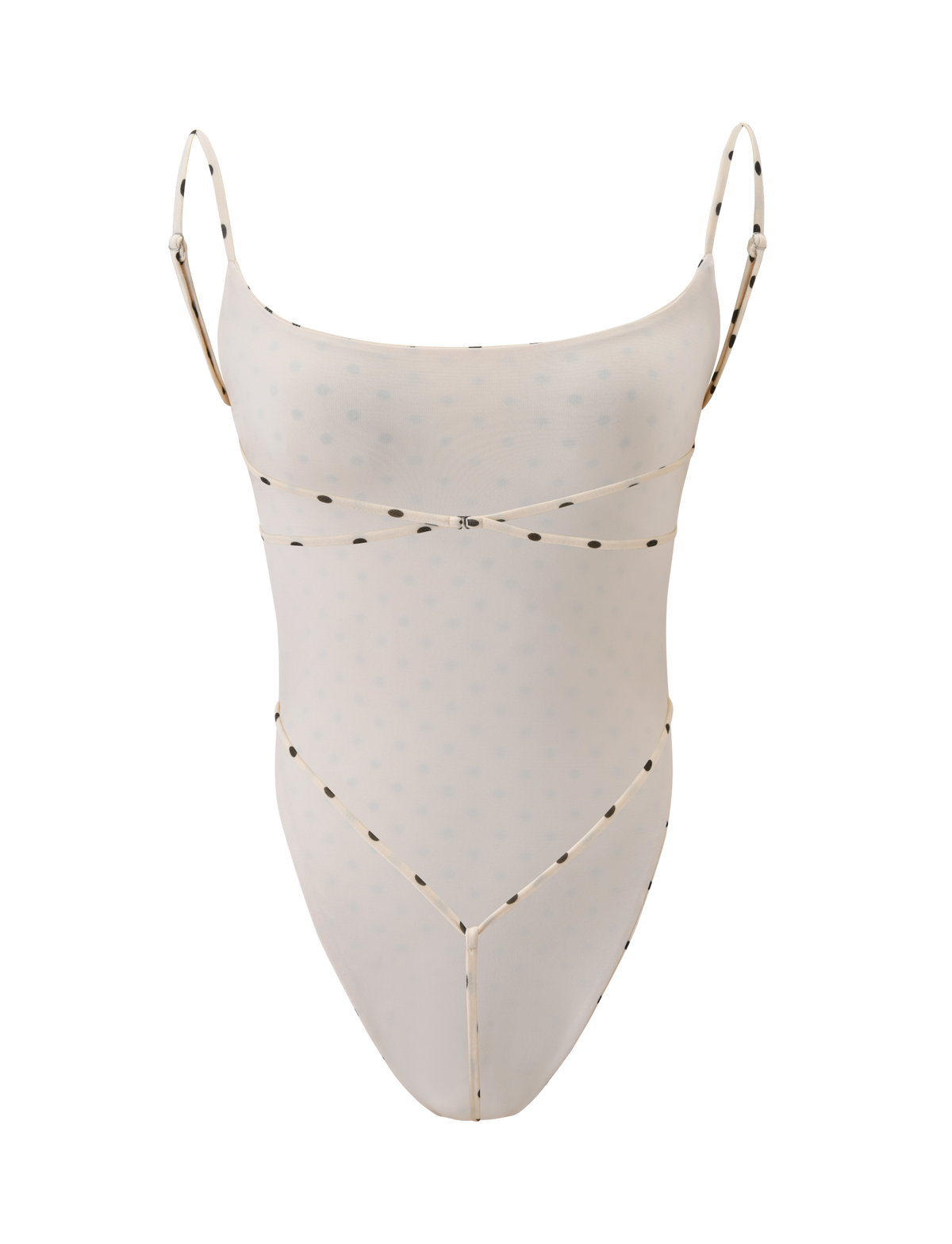 The MINERVA BODYSUIT - CREAM DOT by TIGERMIST features a sheer, pale beige fabric with small dots, thin adjustable straps, minimal trim, and a bodycon fit. Its high-cut leg adds to its lightweight and elegant feminine look.