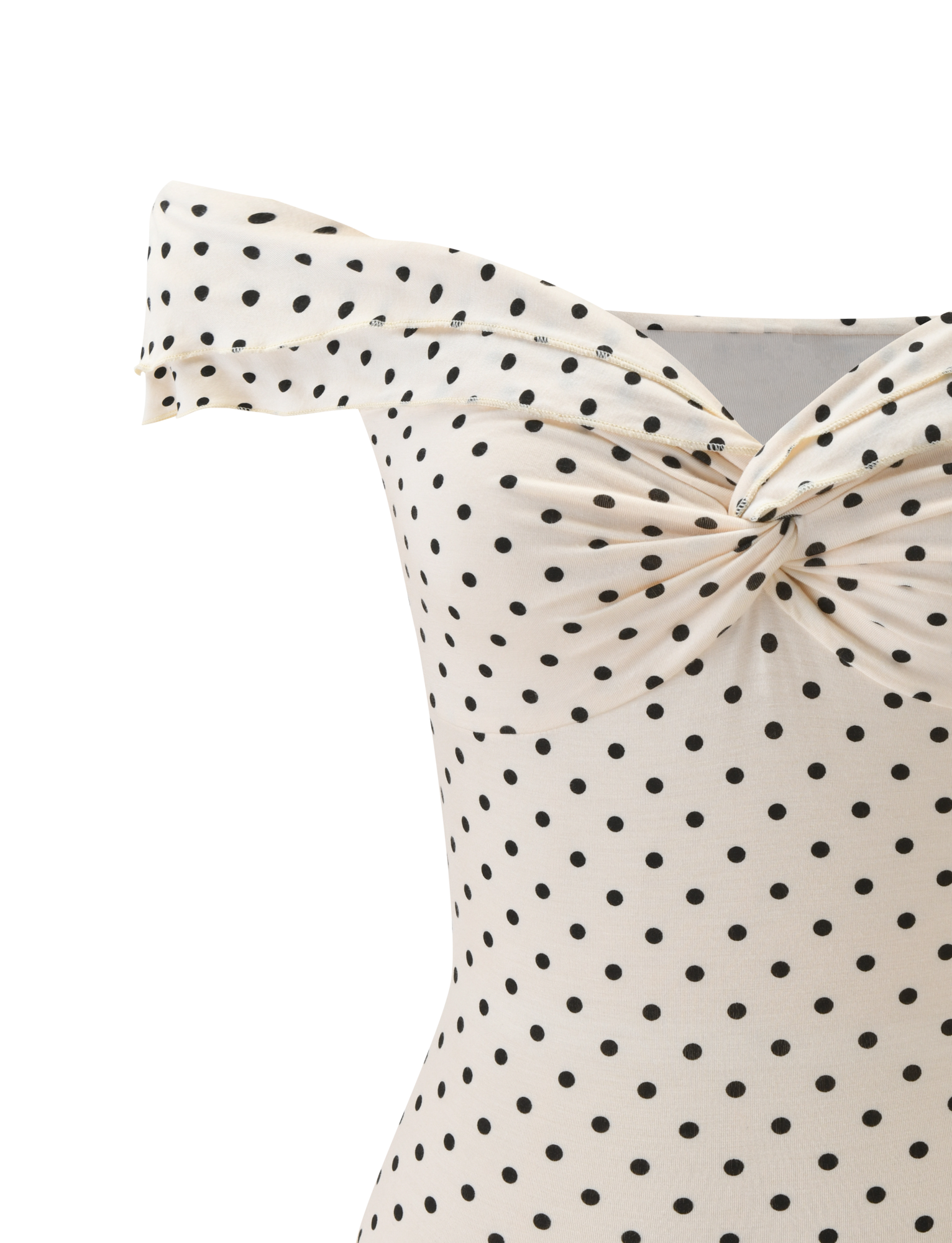 Close-up of the TIGERMIST DENALI TOP - CREAM DOT, an off-shoulder cream top with black polka dots and a twisted knot neckline. Only the upper part is shown.
