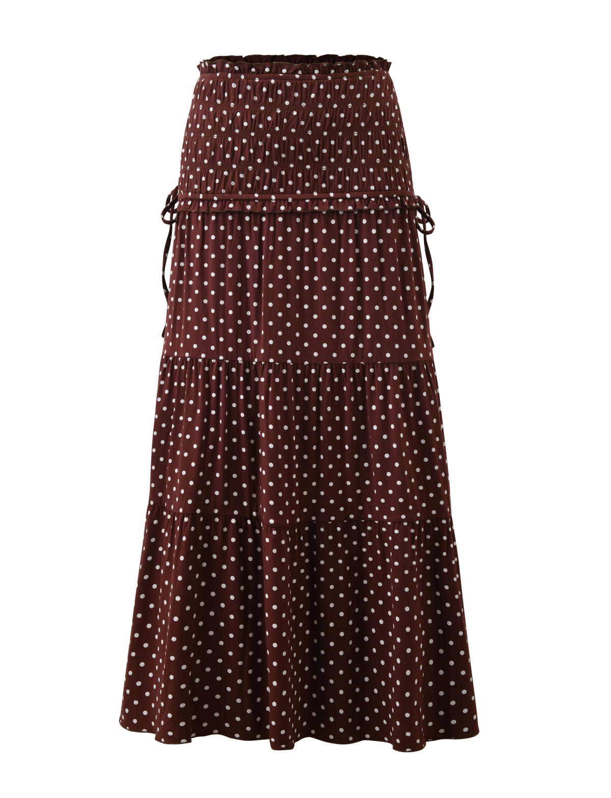 The TIGERMIST DENALI MAXI SKIRT - BROWN DOT is an ankle-length, high-waisted skirt with tiered sections, side drawstring details, soft modal fabric, gathered design, and white polka dots for an effortlessly elegant look.