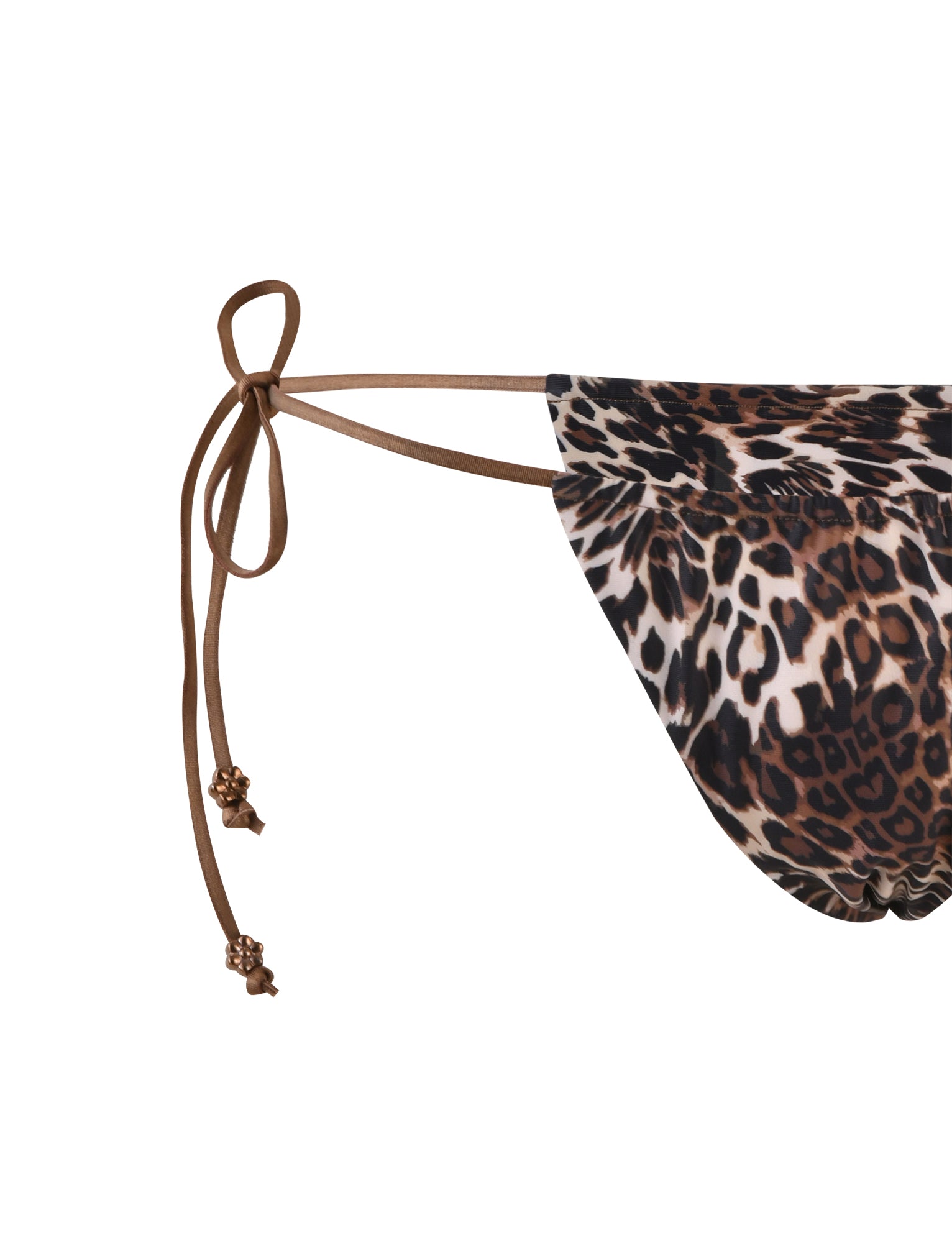 Close-up of the TIGERMIST AVE bikini bottom in leopard print, featuring a side-tie design with thin brown strings and small bead embellishments at the ends. The fabric showcases a mix of black, brown, and beige colors in an animal print pattern.