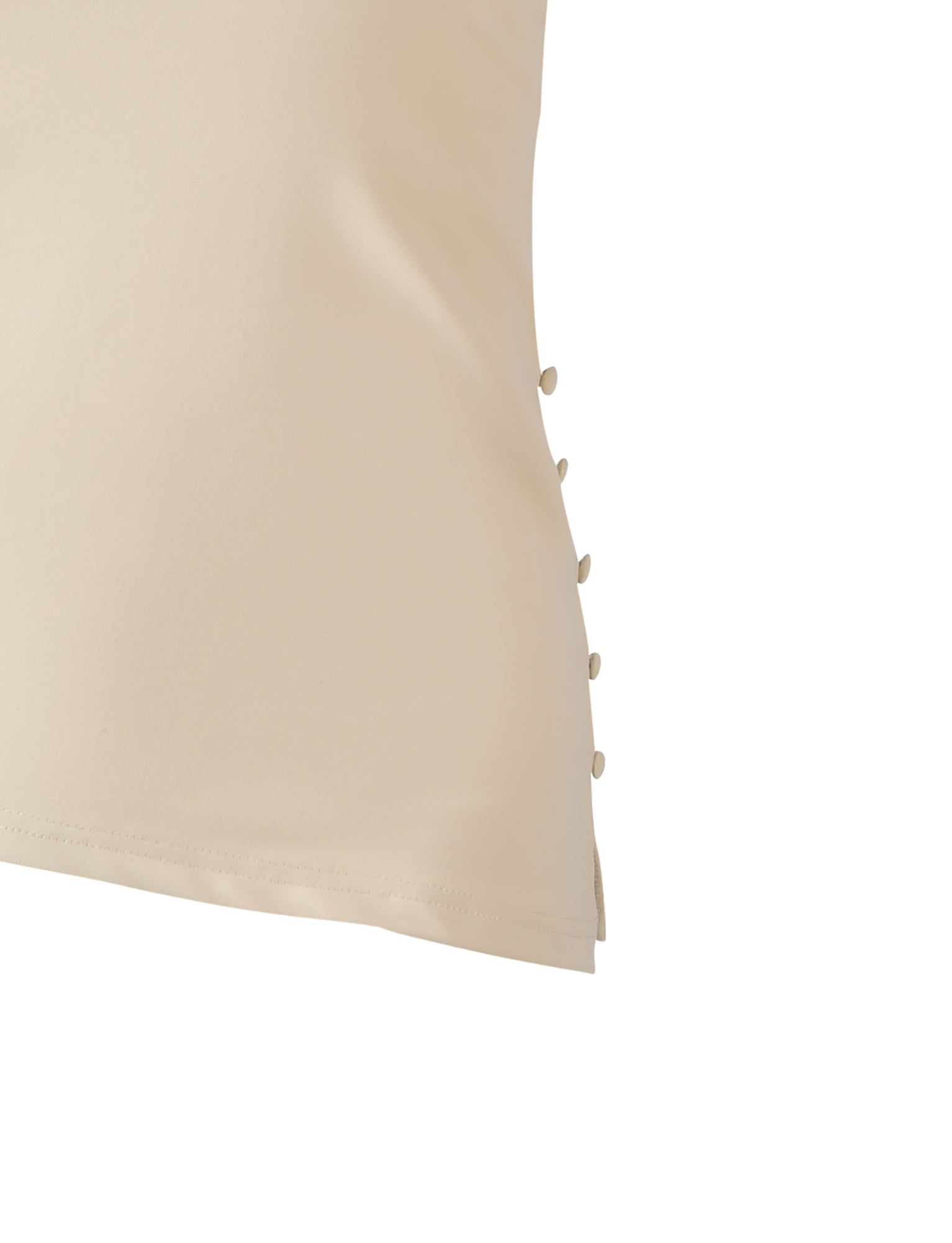 A close-up of the TIGERMIST INDIRA TOP in cream shows its fitted silhouette and row of matching buttons along the seam, set against a white background.