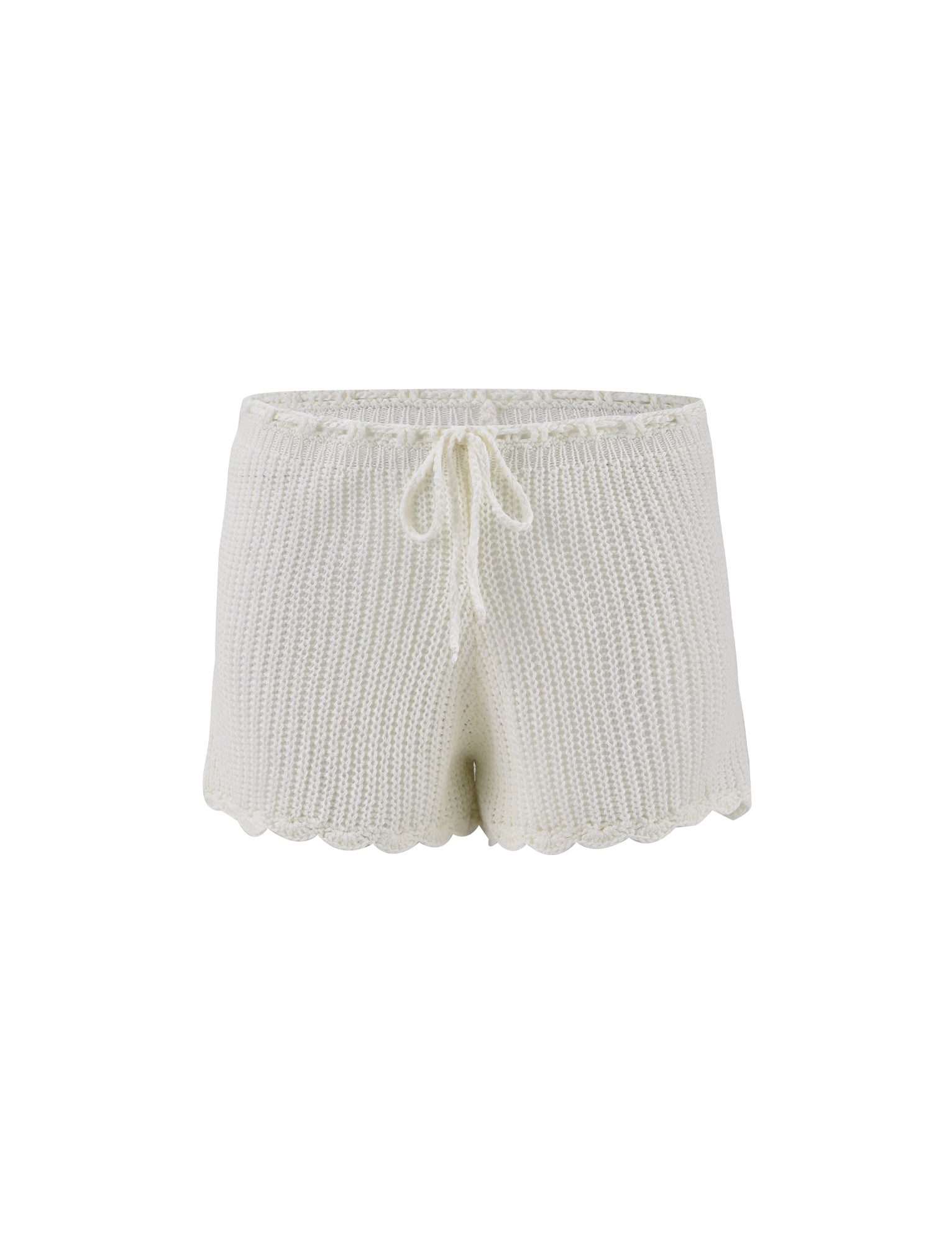 The RIKI SHORT - WHITE by TIGERMIST features an elastic waistband with a front drawstring tie, ribbed knit texture, and scalloped edges at the hem.