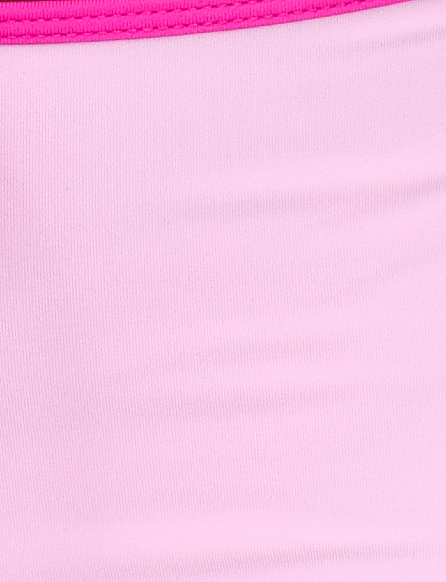Close-up of the TIGERMIST KRISTIN BIKINI BOTTOM - PINK, featuring two shades of pink with a ribbed texture at the top and smooth fabric below.