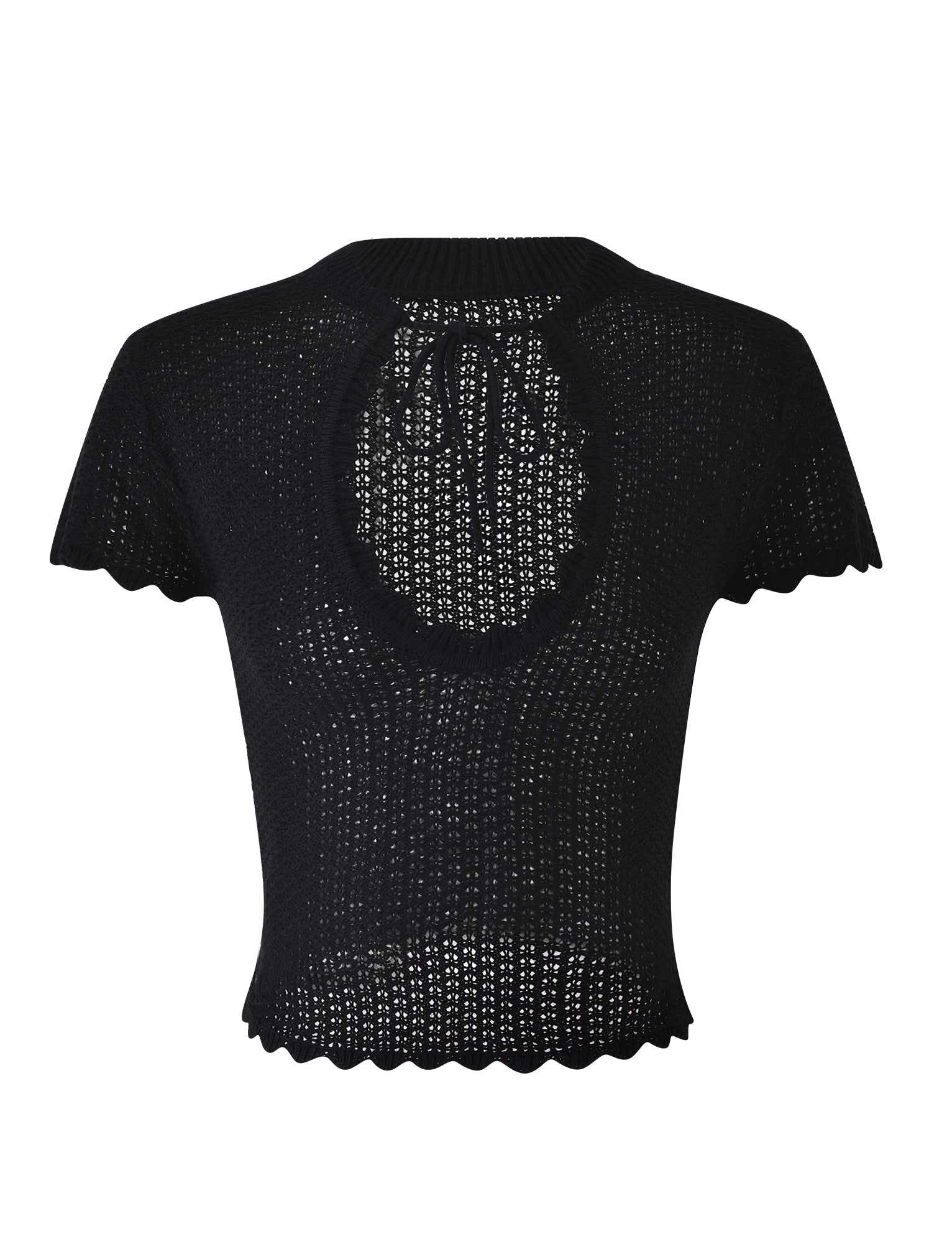 The TEREZA TOP - BLACK from TIGERMIST is a black knitted short-sleeve top featuring a tie detail at the back of the neck and a large keyhole cutout beneath it. The hem and sleeves boast wavy, scalloped edges, while the fabric features a loosely woven, airy pattern.