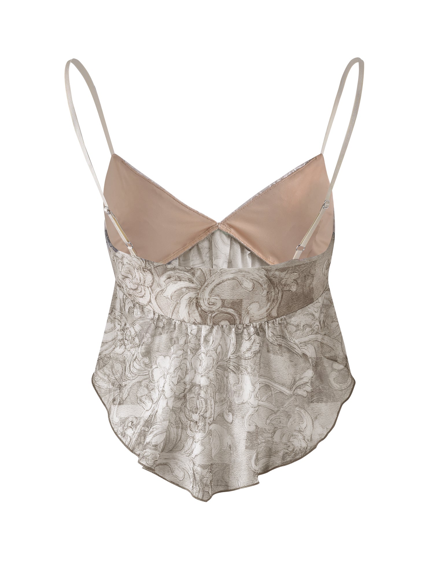 The ALESSIA TOP - BROWN : FLORAL ORNATE from TIGERMIST is a women's sleeveless top featuring thin adjustable straps. The upper section is beige, while the lower section showcases a light-colored, intricately patterned floral design. An asymmetrical and slightly ruffled hemline adds to its delicate and feminine look.