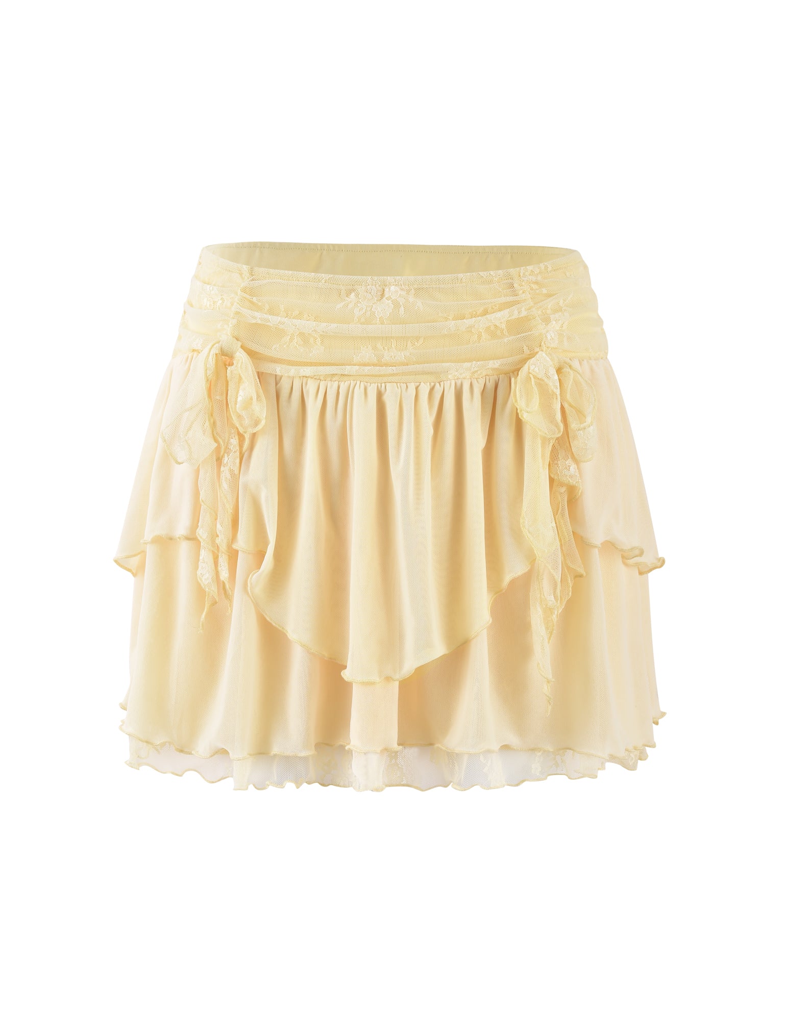 The HARPER MINI SKIRT - YELLOW : LEMON from TIGERMIST is a light yellow, layered chiffon skirt that showcases delicate ruffles and two bow details at the front waistband. This skirt features a slightly asymmetrical hemline and a soft, flowing appearance.