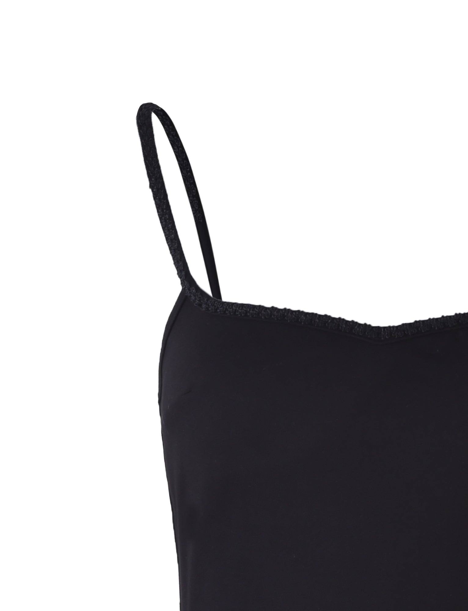 Close-up of the Bessie Dress by TIGERMIST in black against a white background. The focus is on the thin spaghetti straps and the upper section of this TIGERMIST dress, highlighting its simple and sleek design.