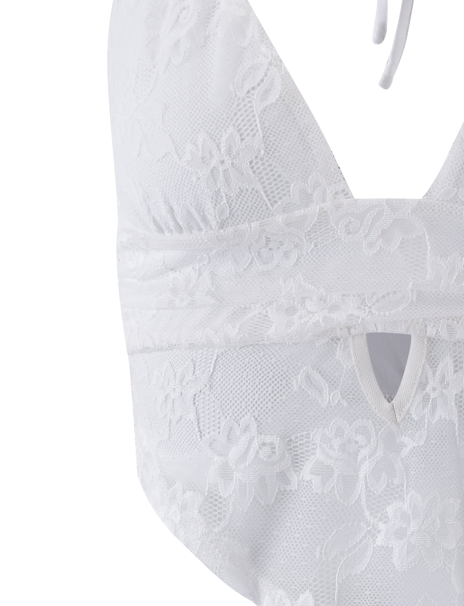 Close-up of the FAYE LACE TOP - WHITE from TIGERMIST, showcasing its delicate floral lace patterns. This elegant bralette features a halter neck design, a V-shaped neckline, and a small keyhole cutout below the bust. The intricate lace details add sophistication to the overall look.