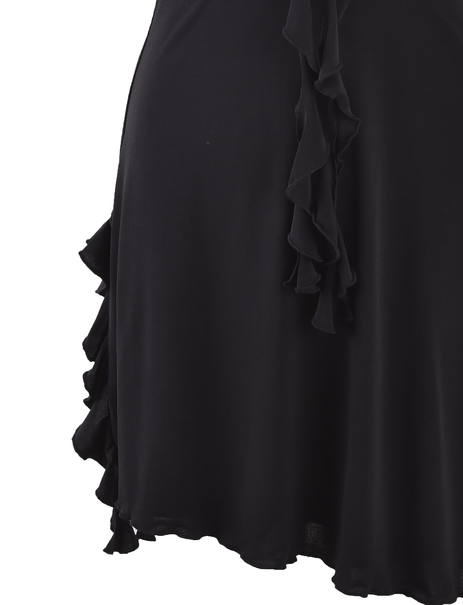 Close-up of the DEENA DRESS - BLACK from TIGERMIST focusing on the lower half. The dress features asymmetrical ruffle details cascading down the right side and along the hemline, adding texture and movement to the fabric. The material appears lightweight and slightly draped.