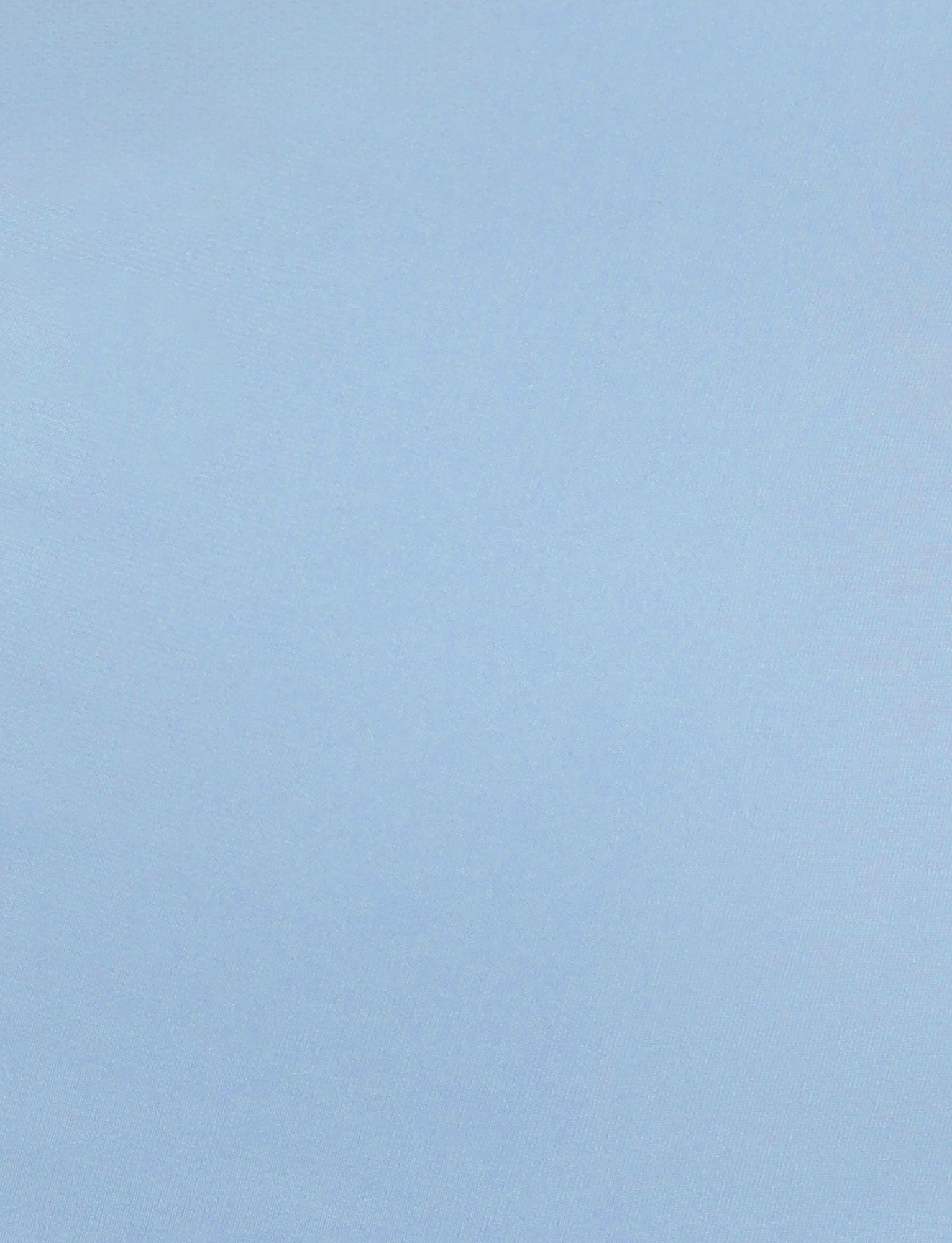 A plain, solid baby blue background with a smooth finish, inspired by the serene hue of TIGERMIST’s ZITA DRESS - BLUE : BABY BLUE.