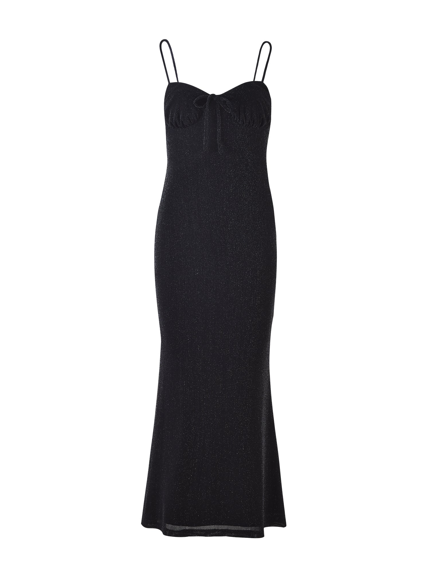 The CATYA DRESS - BLACK : BLACK SHIMMER by TIGERMIST is a sleeveless, full-length evening gown featuring thin spaghetti straps and a sweetheart neckline adorned with a small bow at the center. Its form-fitting silhouette gently flares at the hem and is crafted from subtle, shimmering fabric.