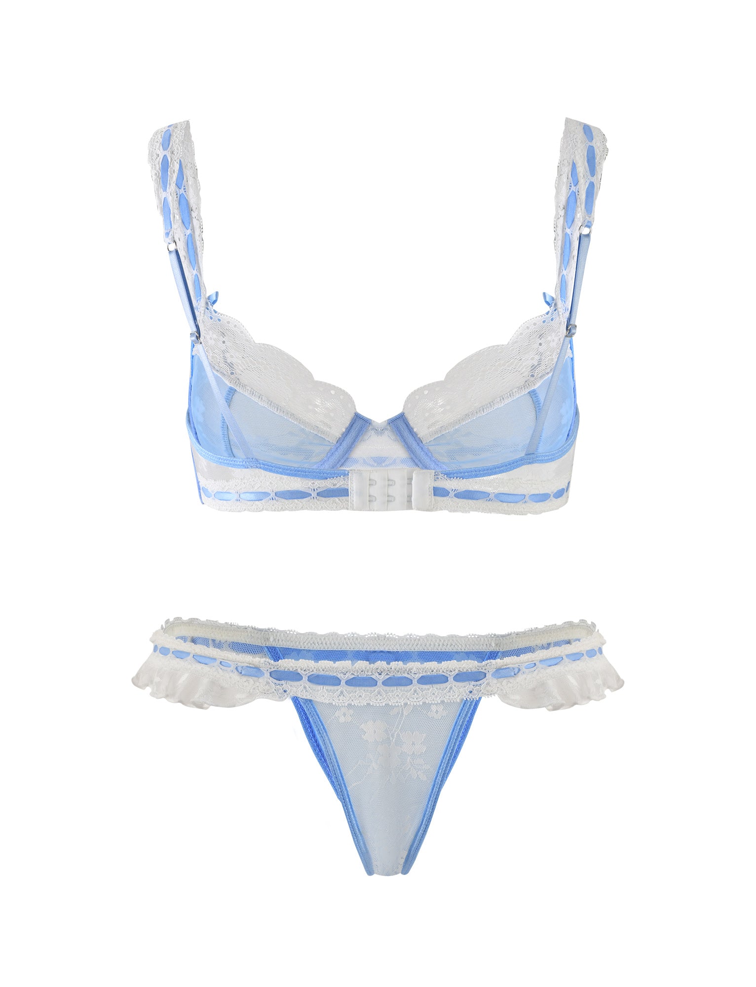 Check out the stunning TIGERMIST LAVINA SET in BABY BLUE, featuring a sheer baby blue bra with white lace trim, adjustable straps, and a hook closure at the back. The matching thong is adorned with a delicate lace pattern and frilled edges on either side.
