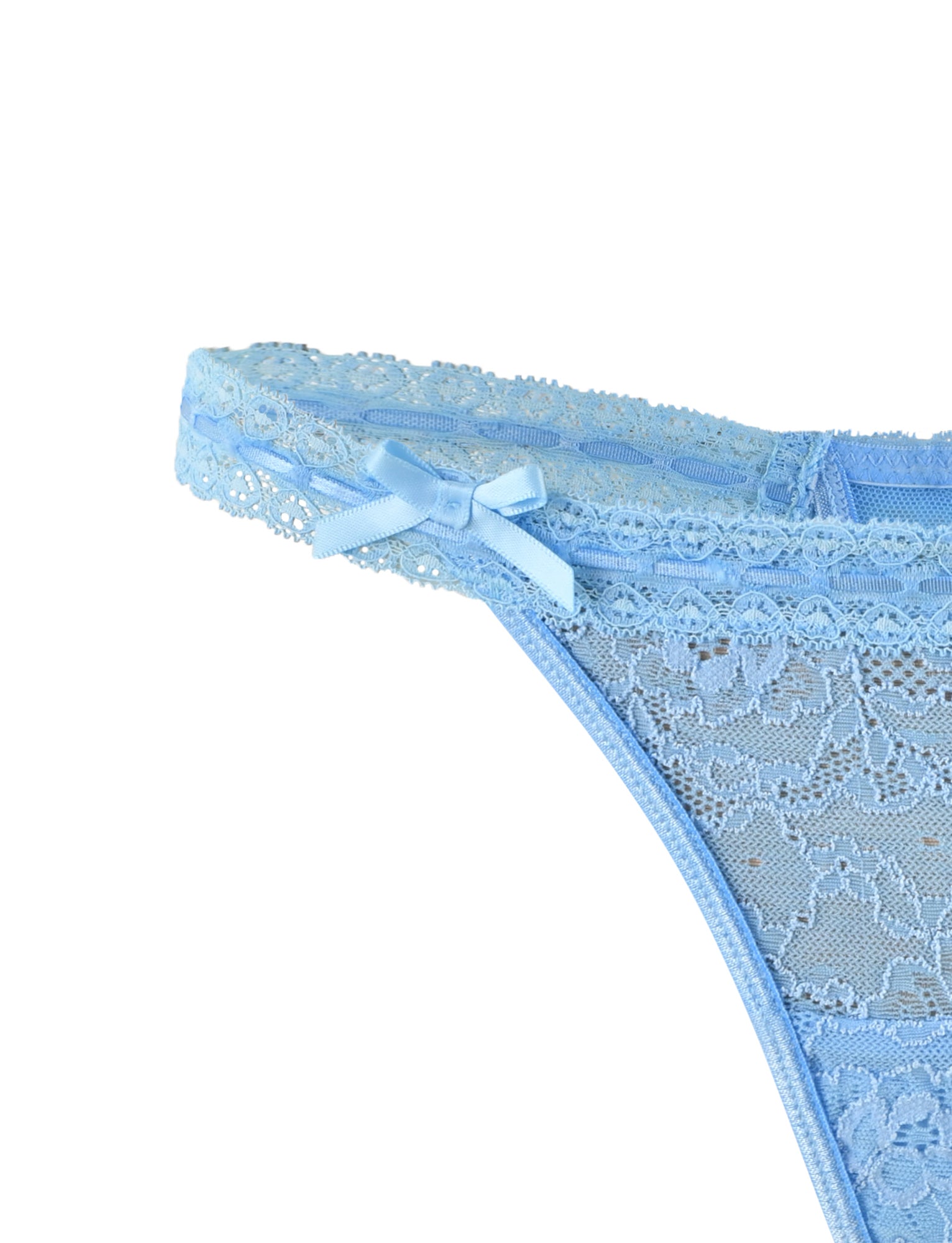 Close-up of the PANDORA SET - BLUE from TIGERMIST, featuring light blue lace lingerie adorned with intricate floral patterns and a small decorative bow on the hip waistband. The delicate, semi-transparent fabric highlights detailed craftsmanship. Only a portion of this exquisite lingerie is visible.