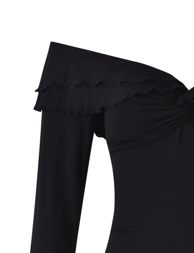 Close-up of the Denali Long Sleeve Top in black from TIGERMIST. This off-the-shoulder top features a ruffled edge along the neckline, adding a touch of elegance to its design. The fabric appears smooth and fitted, emphasizing a sleek and stylish look.
