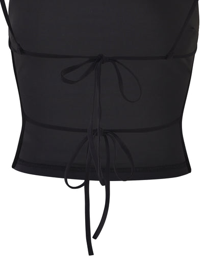 Close-up of the JAIDA TOP - BLACK from TIGERMIST featuring sheer fabric with three thin tie straps. The straps are arranged horizontally at intervals from top to bottom, giving it a sleek and stylish look. The fabric appears to be lightweight and slightly transparent.