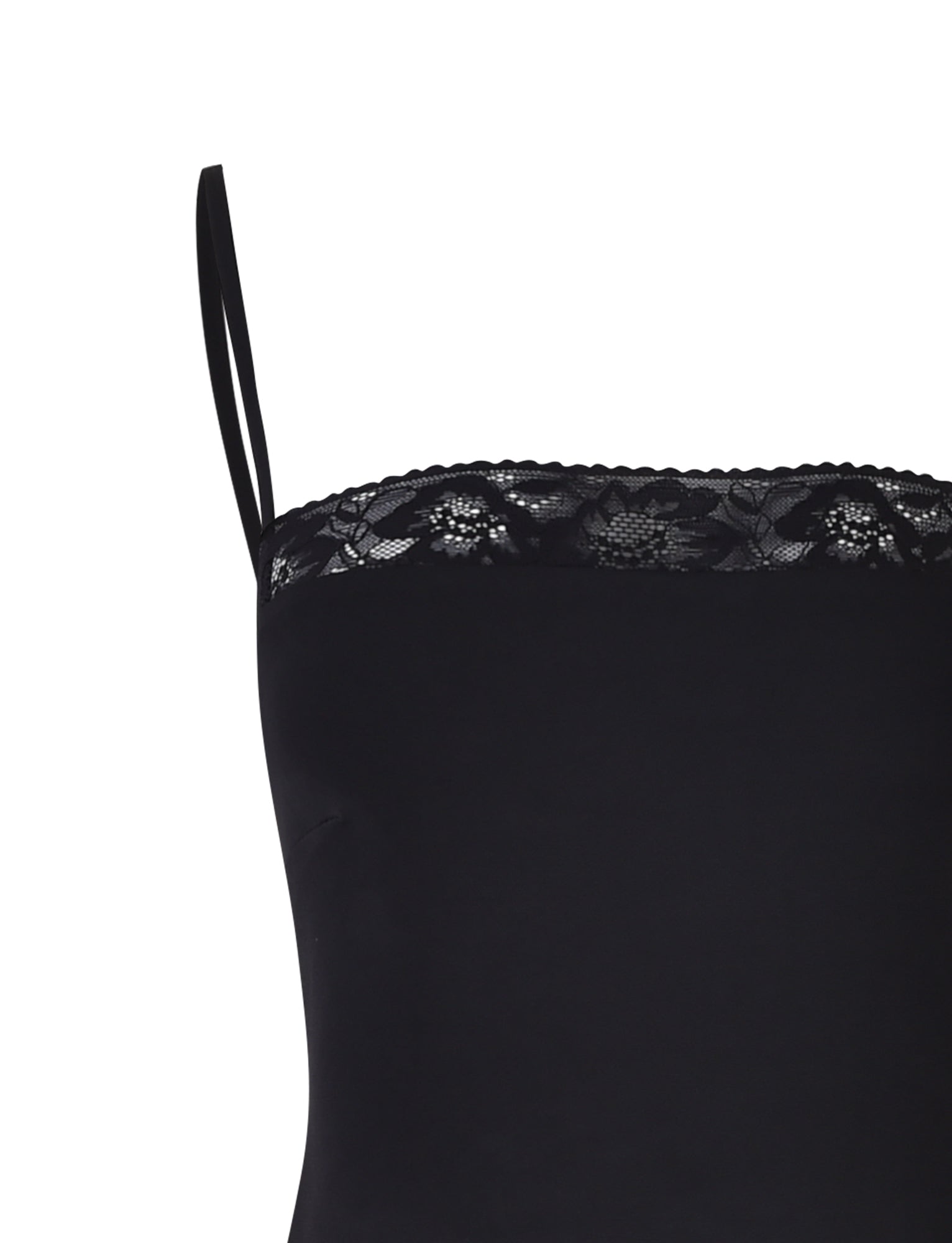 Close-up view of the upper portion of a black JAIDA MAXI DRESS by TIGERMIST, featuring thin shoulder straps and delicate lace trim along the top edge. The lace, adorned with a floral pattern, adds a decorative touch to the fabric.