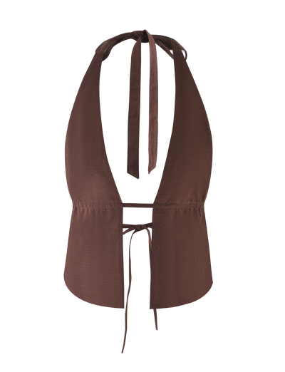 The LAINEY TOP - CHOCOLATE by TIGERMIST is a chocolate brown linen halter crop top featuring a deep V-neckline, adjustable neck and back ties, and slightly textured fabric.