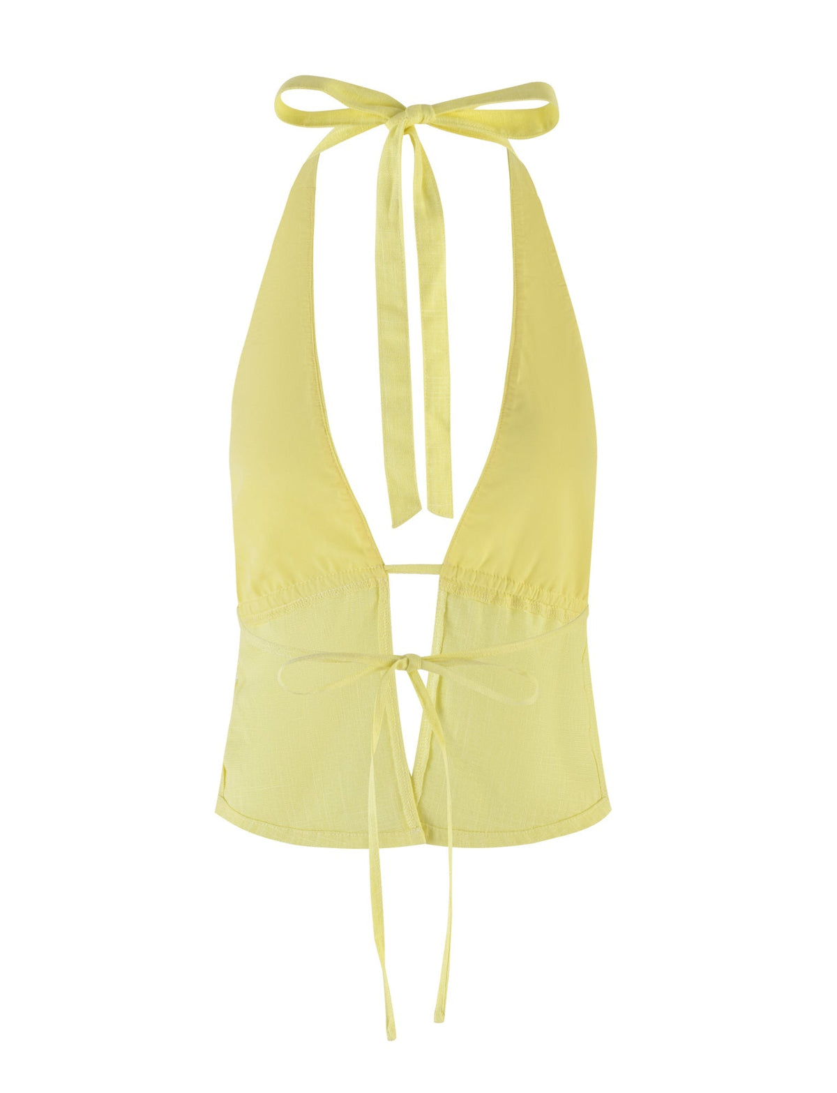The LAINEY TOP - YELLOW : LEMON from TIGERMIST is a stylish halter top in a vibrant yellow shade. It features a deep V-neck and an open back, with thin ties at the neck and lower back that create an elegant bow in the front center. This design is perfect for summer wear.