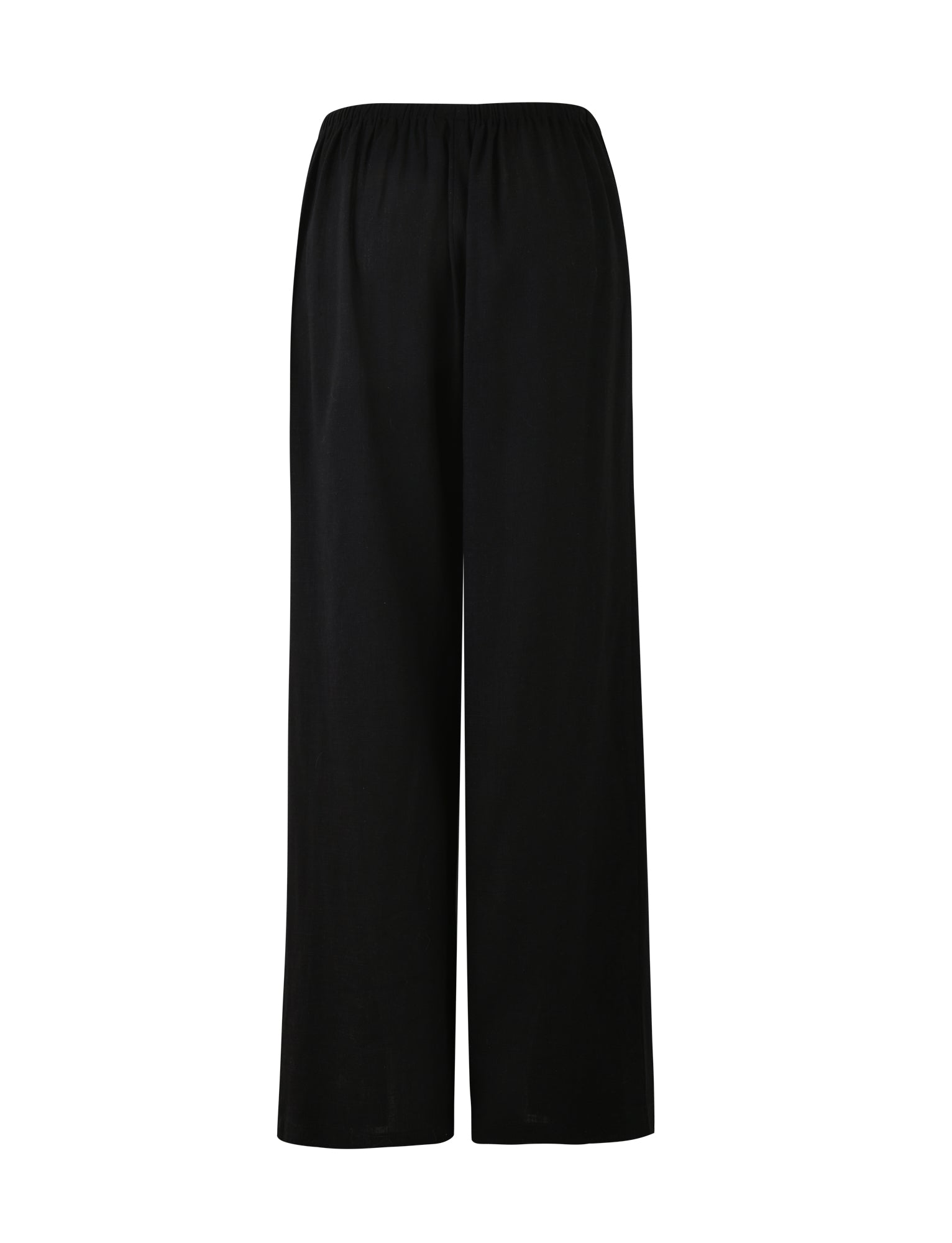 Introducing the LAINEY PANT in BLACK from TIGERMIST: these loose-fitting, long pants feature an elastic waistband and a straight-cut design, offering both relaxation and comfort. Their versatile solid black color makes them suitable for various occasions.