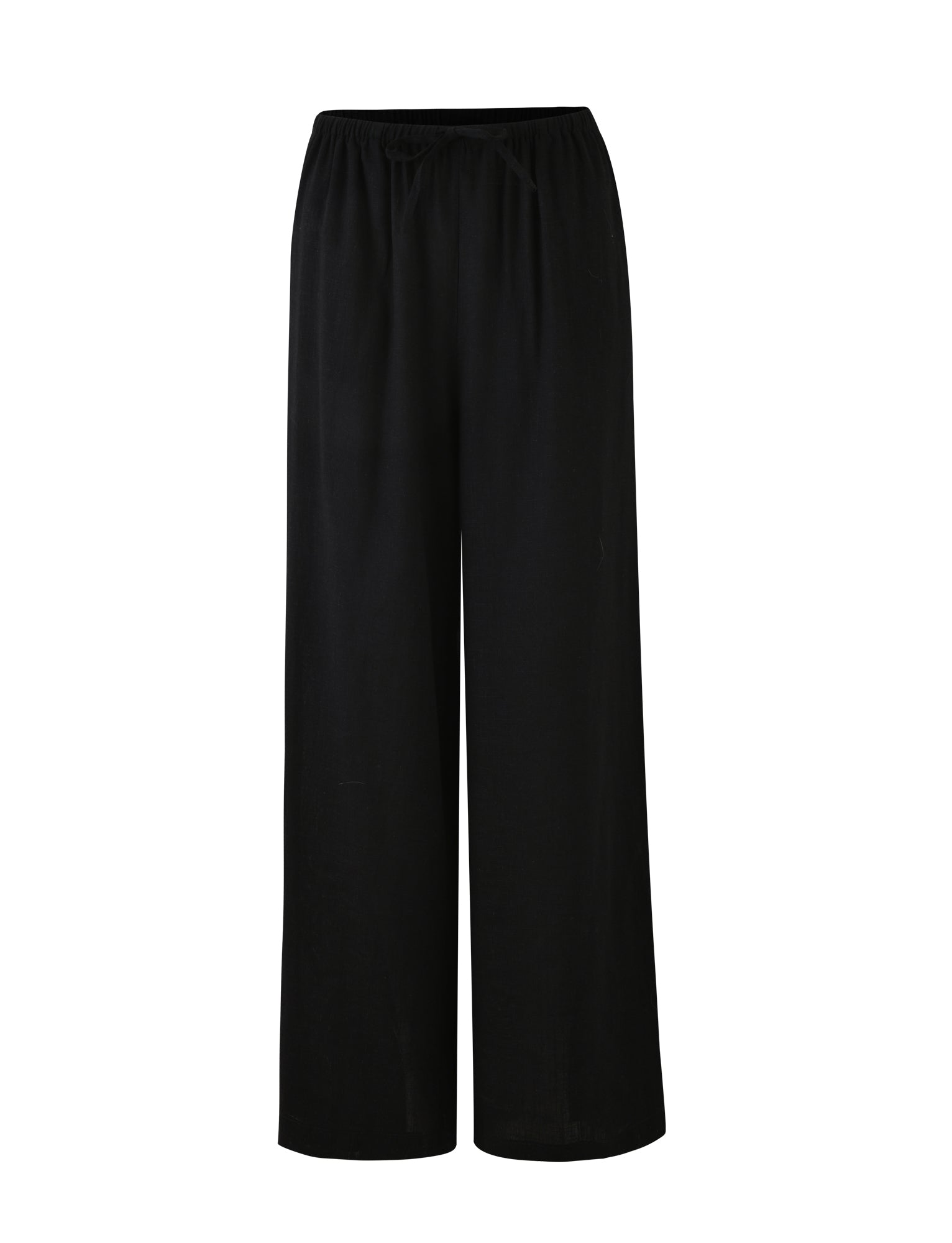 A pair of LAINEY PANTS in black from the TIGERMIST brand. These wide-leg pants are crafted from a lightweight fabric and feature an elastic waistband for ultimate comfort and ease of wear. With a simple, clean design devoid of visible pockets or embellishments, these trousers are perfect for various casual or semi-formal occasions.