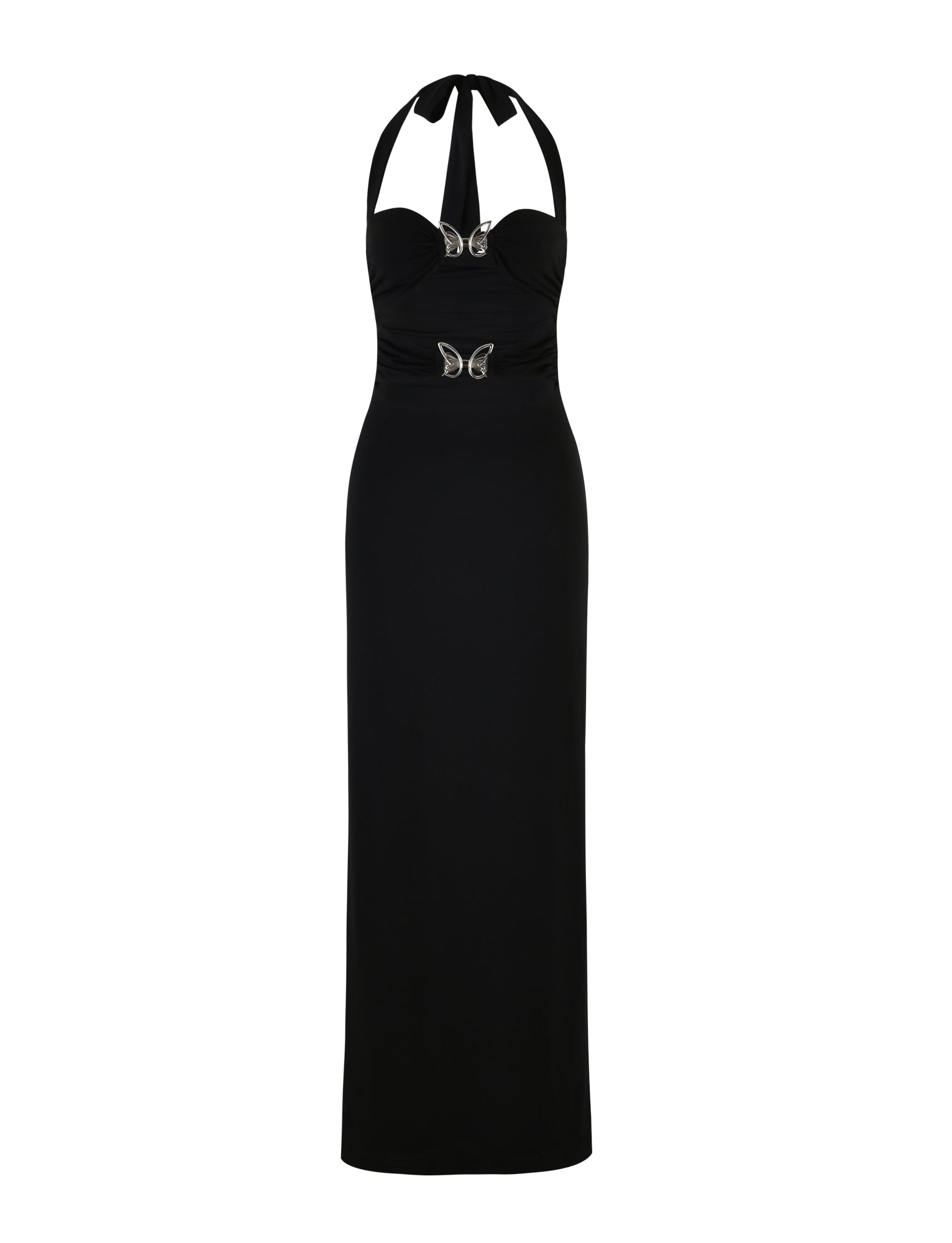 A long, elegant black halter-neck dress called the CORALINE DRESS - BLACK from TIGERMIST with a fitted silhouette. The bodice features ruching and two decorative butterfly-shaped embellishments, creating a glamorous and sophisticated look.