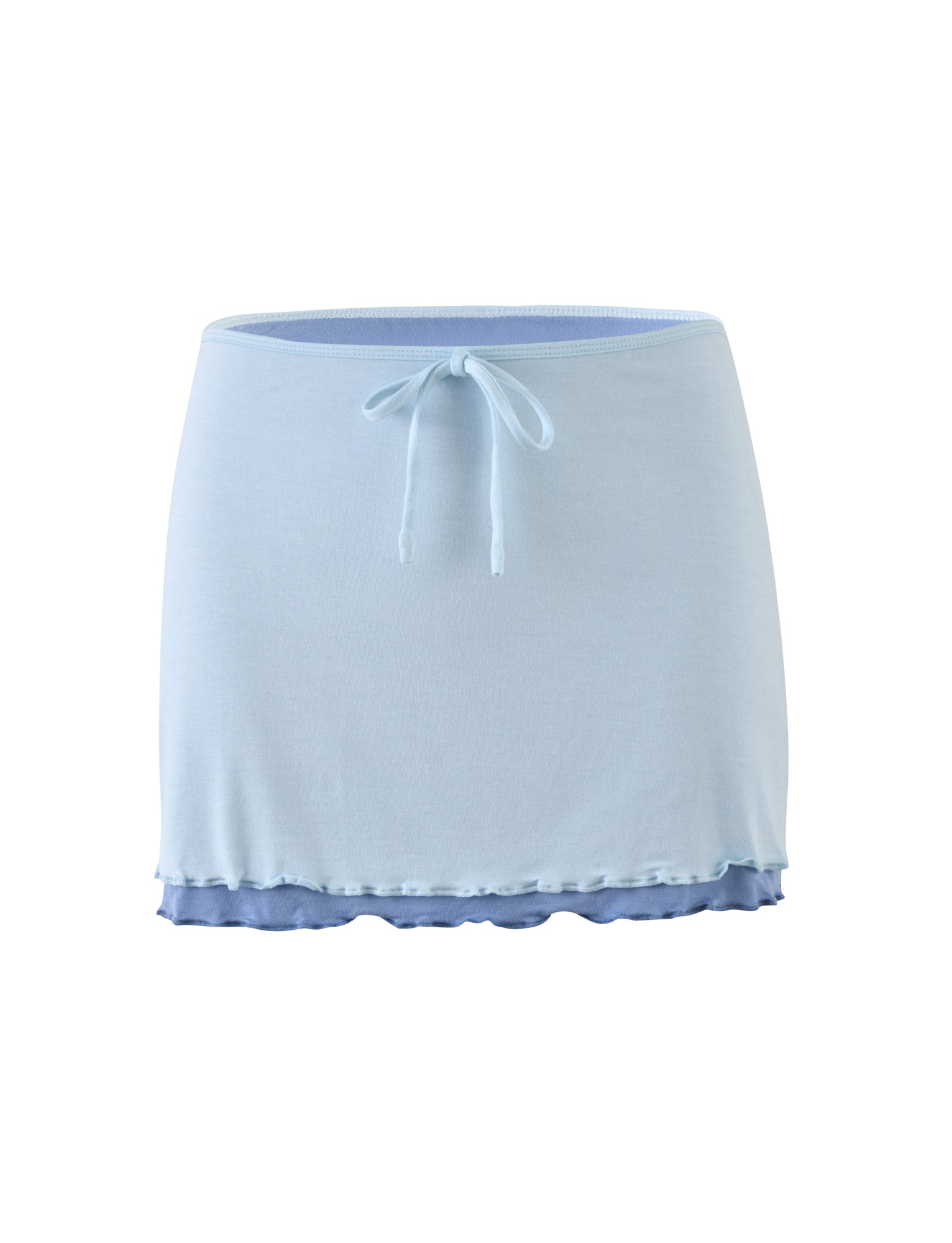 Introducing the ADAIR SKIRT - BLUE by TIGERMIST: a light blue mini skirt featuring an elastic waistband and a charming small bow tie at the front. The skirt has a double-layered hem, with the top layer in light blue and the bottom layer in a darker blue, creating an elegant ruffled effect. Crafted from soft and stretchy fabric for ultimate comfort.