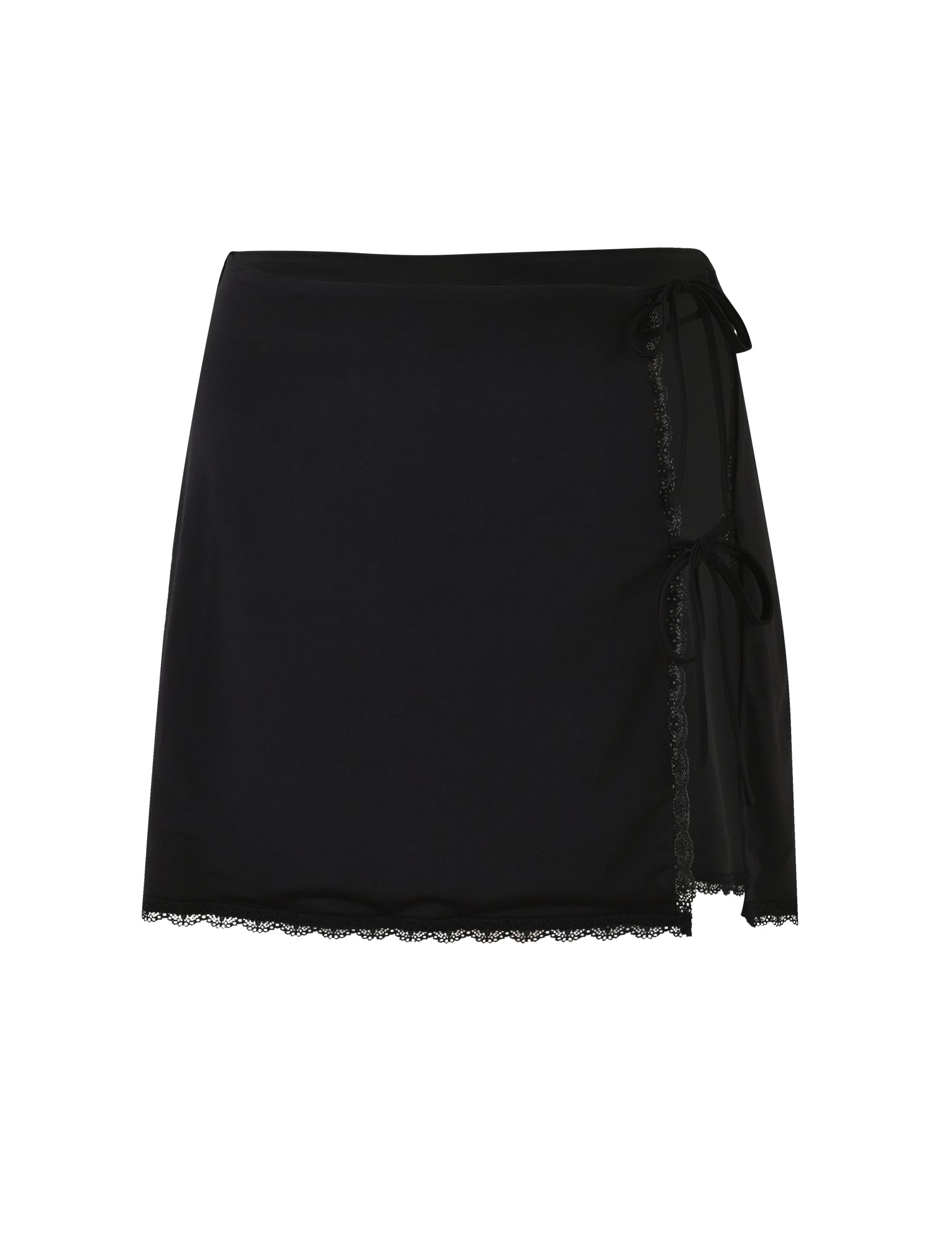 The KRAVEN SKIRT - BLACK from TIGERMIST features a side tie closure and delicate lace trim along the hemline. This black wrap skirt has a smooth, sleek appearance with a slightly sheer overlay at the tie area.
