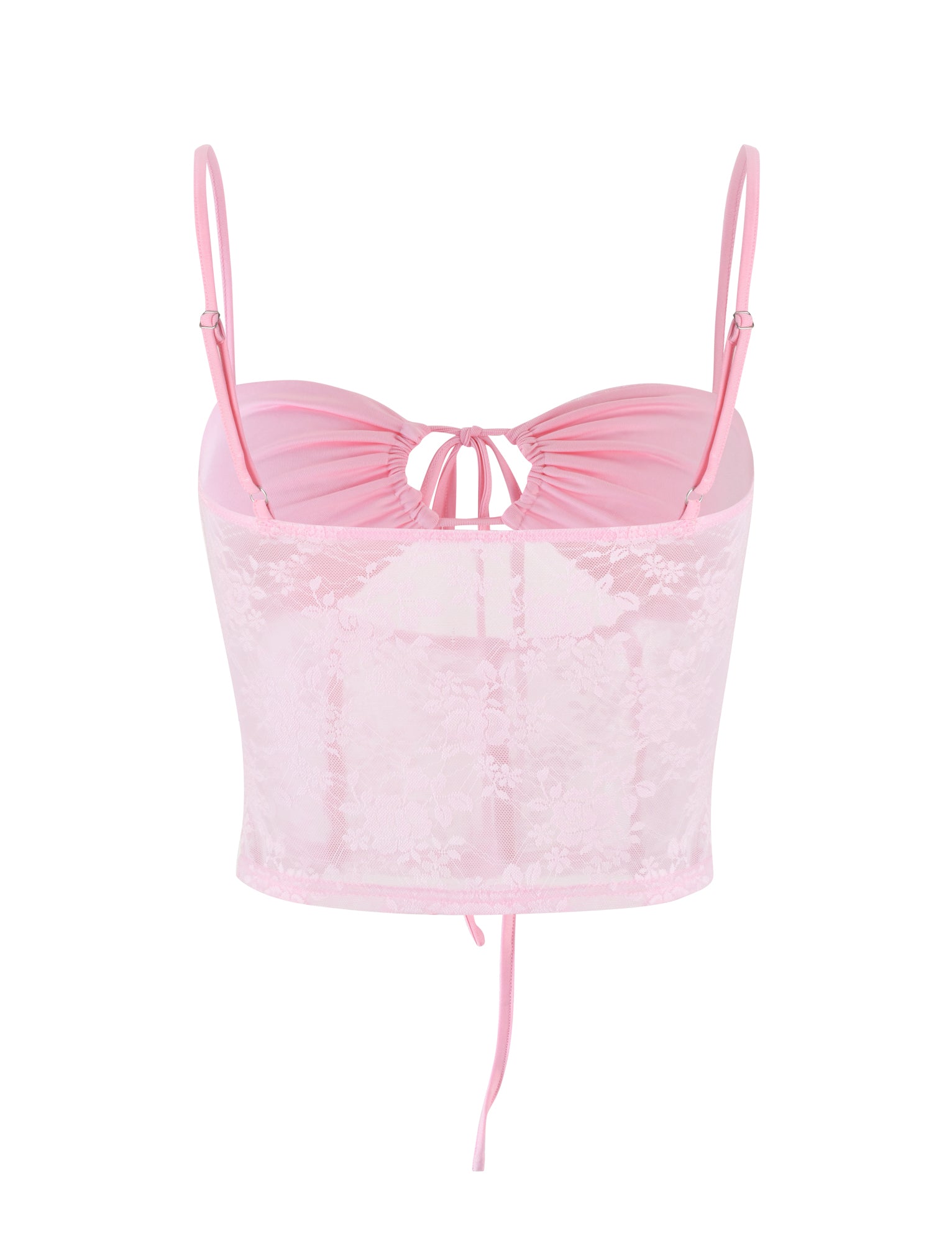 The TOBIAS TOP from TIGERMIST is displayed on a white background in a pastel pink shade. This lace crop top features thin adjustable spaghetti straps and a ruched bust with a small keyhole cutout tied with a bow. The semi-sheer material showcases a floral lace design, completing the look with a cropped hem.
