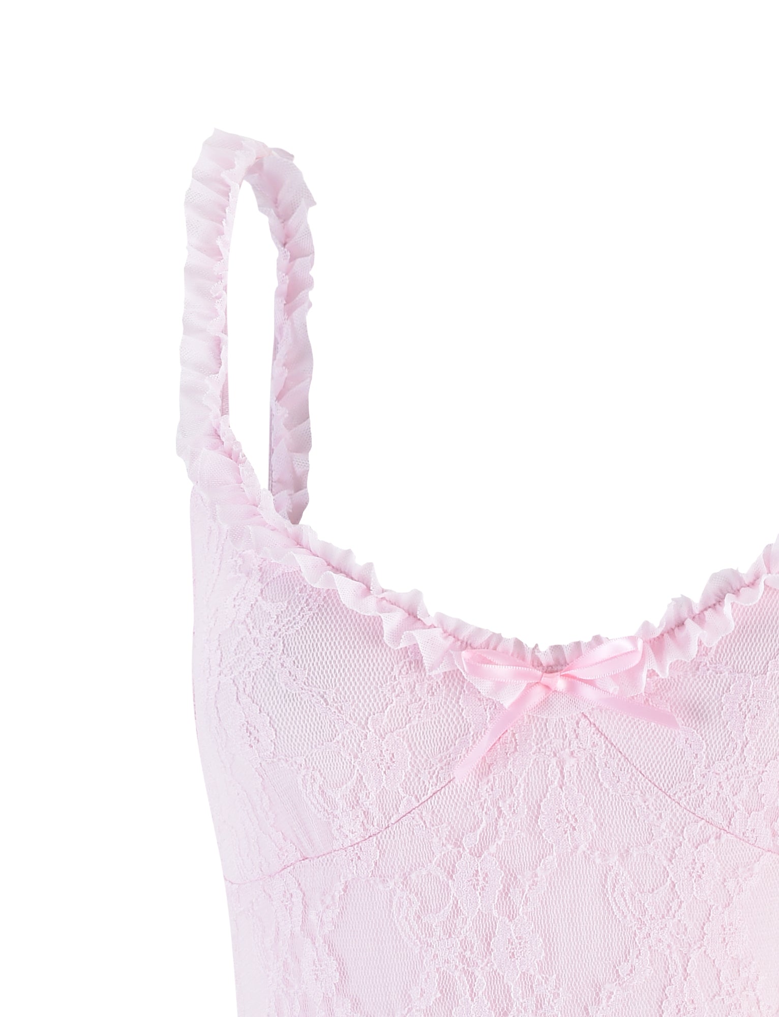 Close-up of the DEJA BODYSUIT - PINK by TIGERMIST. This pastel pink bodysuit boasts a light pink hue with lace-trimmed details and thin, ruffled straps. Its fabric features a delicate floral lace pattern, accented by a small satin bow centered at the top edge. The overall design exudes soft feminine charm, embodying the chic elegance synonymous with Tiger Mist collections.