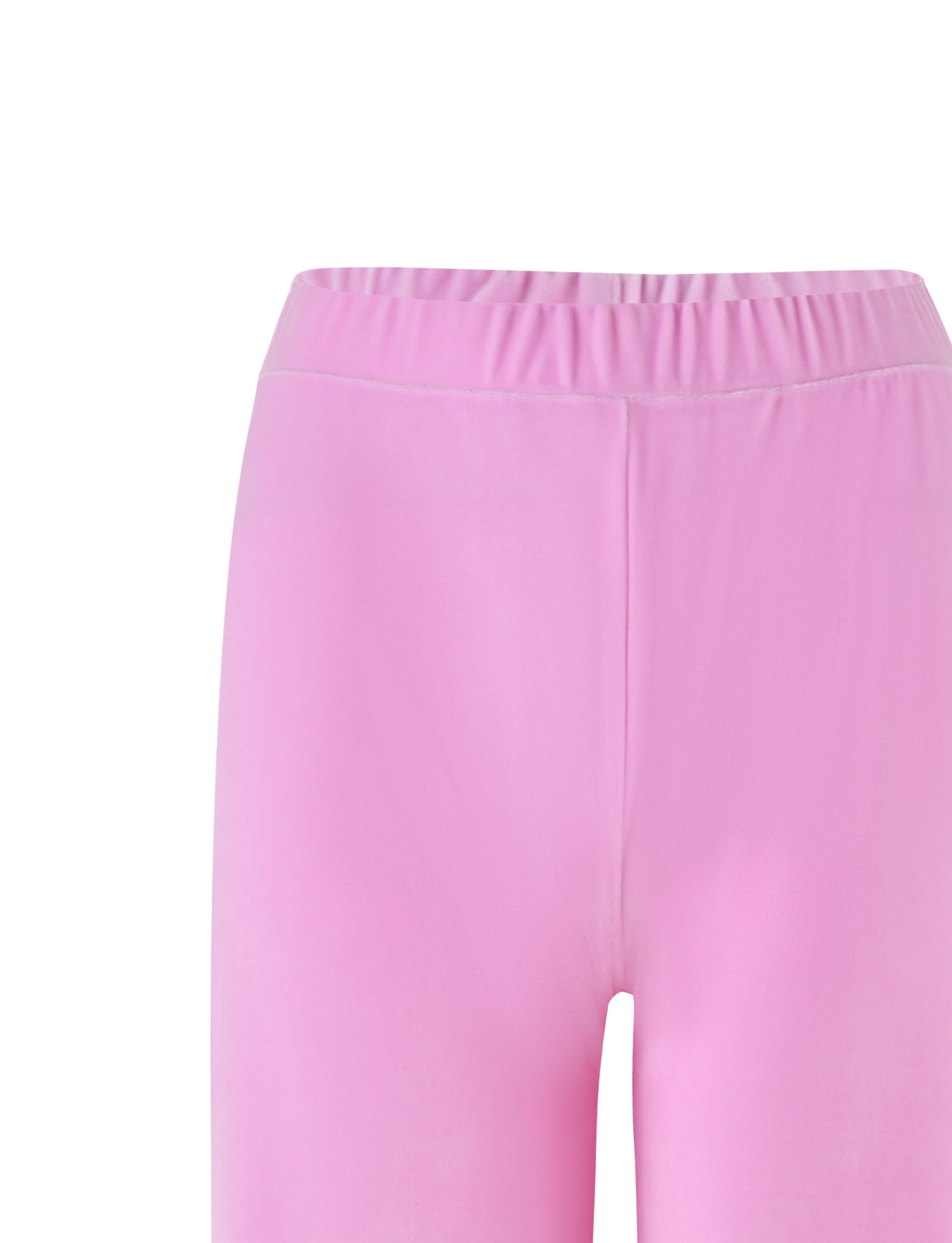 The image showcases a close-up of the waist and upper thighs of the ERICKA PANT - PINK : BABY PINK by TIGERMIST. These pants feature an elastic waistband and are crafted from a smooth, stretchy fabric. The background is plain white.