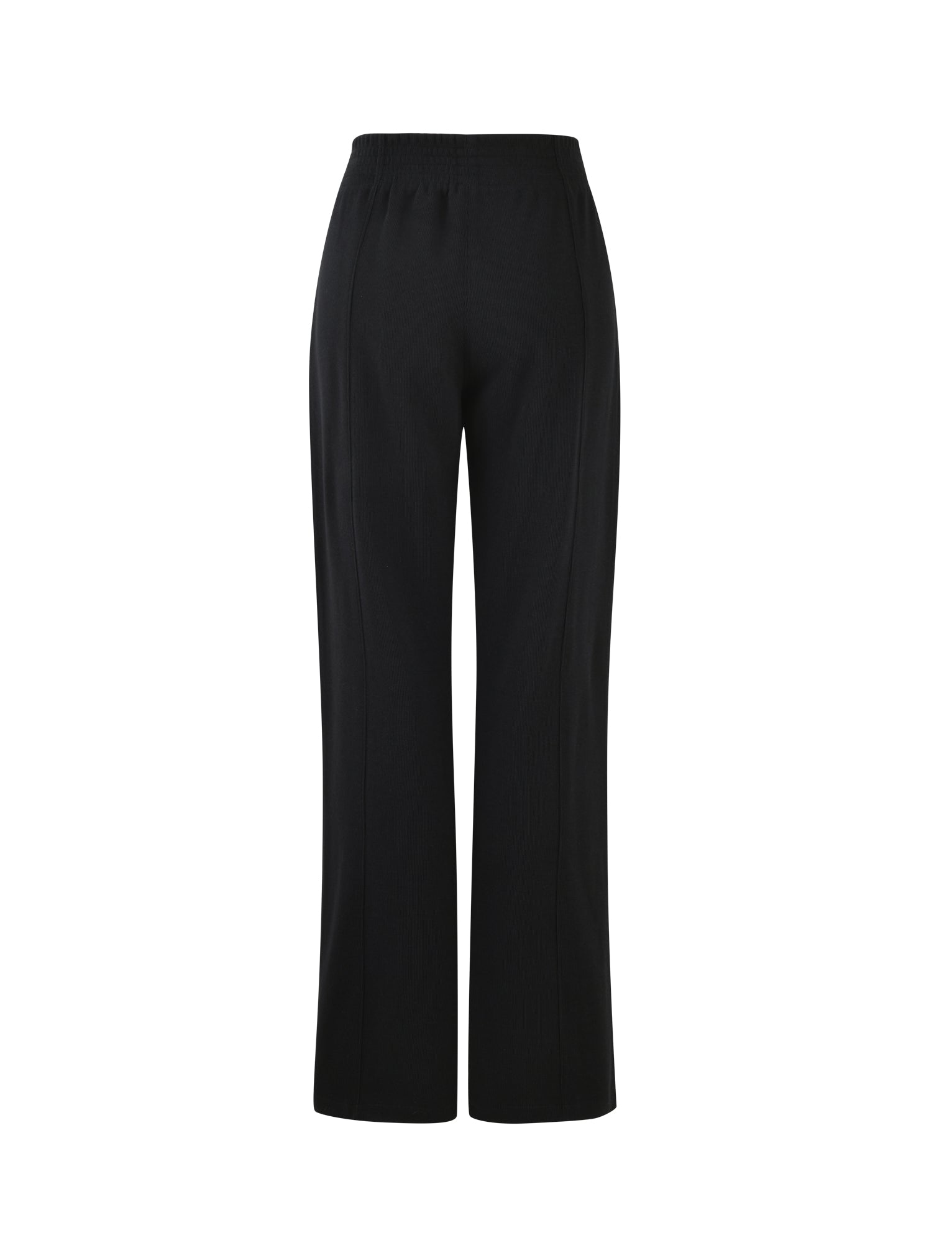 The VERDA PANT - BLACK from TIGERMIST is showcased against a plain white background. These high-waisted, wide-leg pants are crafted from smooth fabric and come with an elastic waistband.