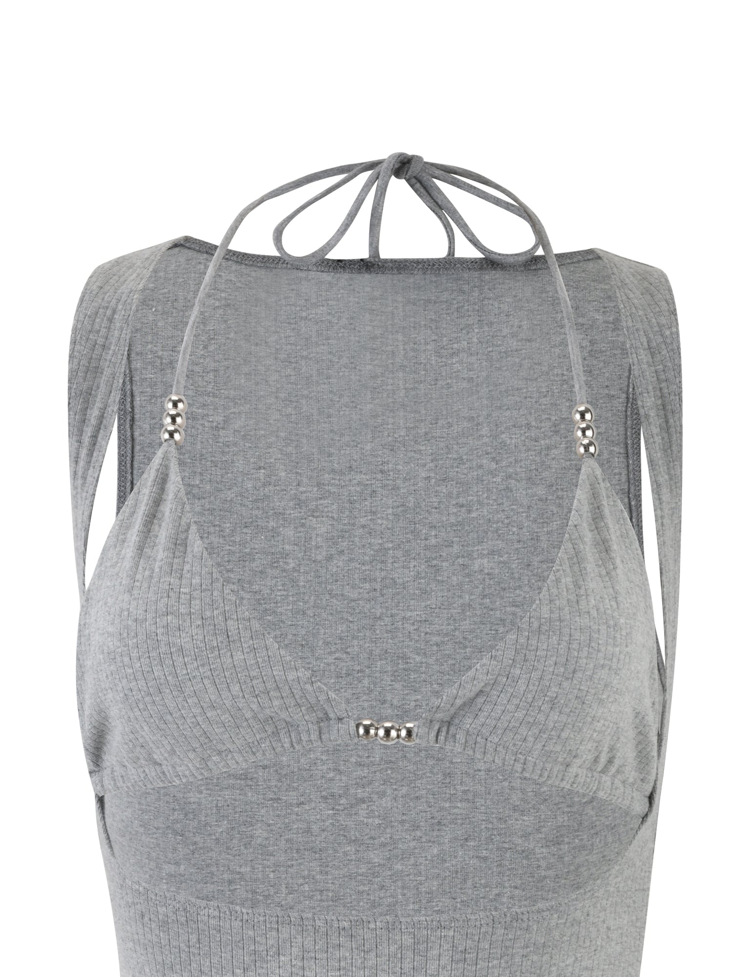 A close-up image of the TARYN BODYSUIT - GREY from TIGERMIST showcasing its ribbed knit design. The soft, stretchy fabric halter top features beaded string details around the V-neckline and ties at the back of the neck, with additional beads on the front straps for an elegant touch.