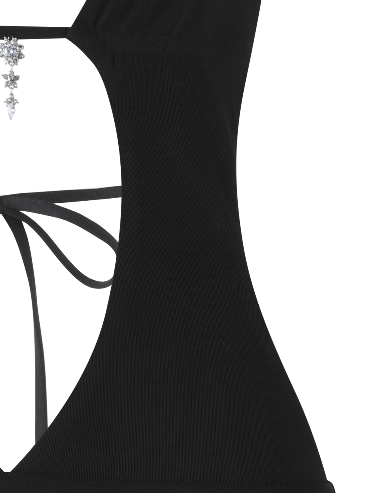 Close-up of the ESHA DRESS - BLACK by TIGERMIST, featuring thin straps tied in a bow at the back, a sparkling pendant at the neckline, and a mini bodycon silhouette.