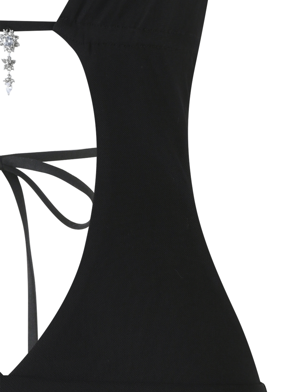 Close-up of the ESHA DRESS - BLACK by TIGERMIST, featuring thin straps tied in a bow at the back, a sparkling pendant at the neckline, and a mini bodycon silhouette.