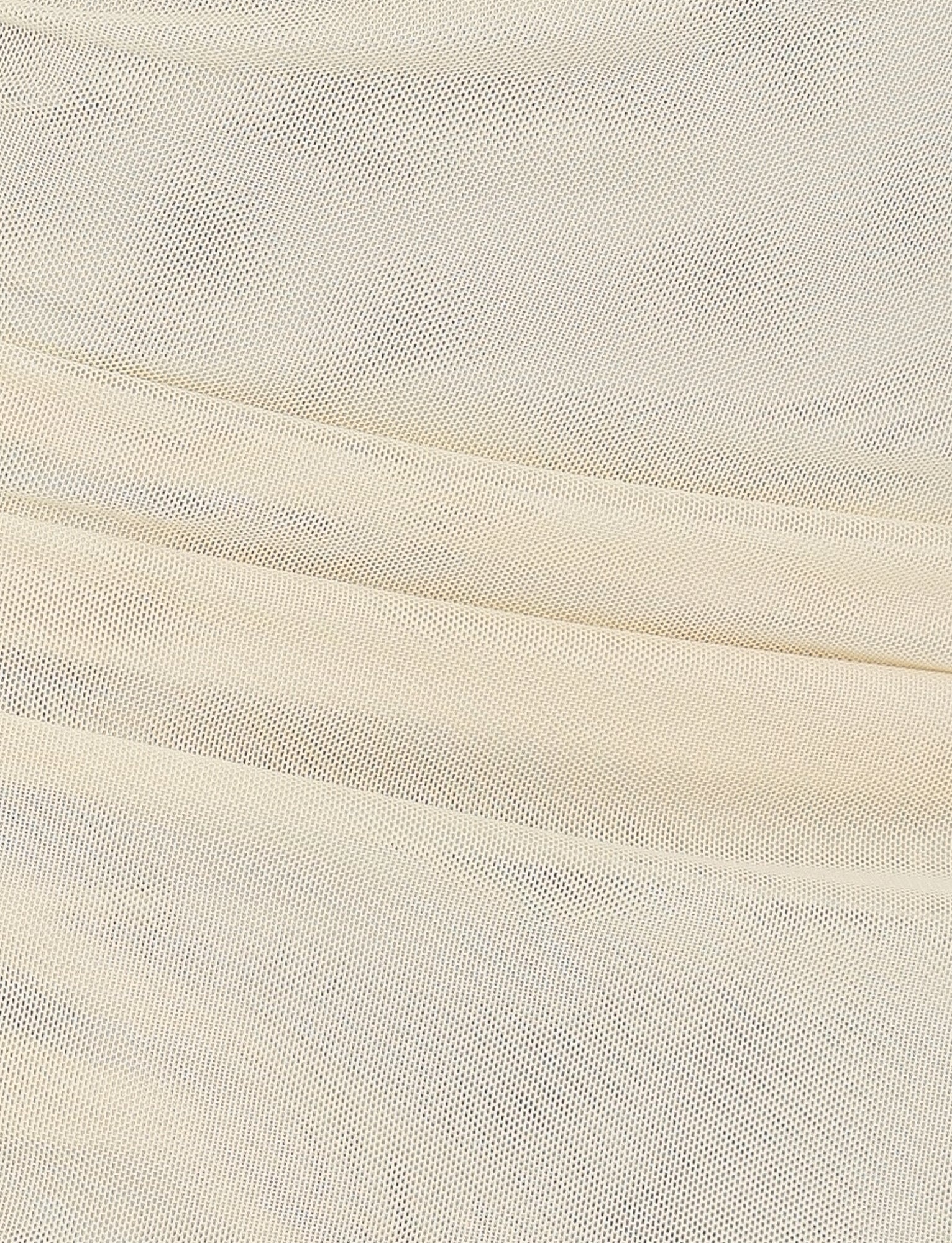 Close-up of light beige fabric with a fine mesh texture, showcasing soft folds and a smooth surface, reminiscent of the elegant flow in TIGERMIST's Ginny Maxi Skirt in Yellow: Lemon.