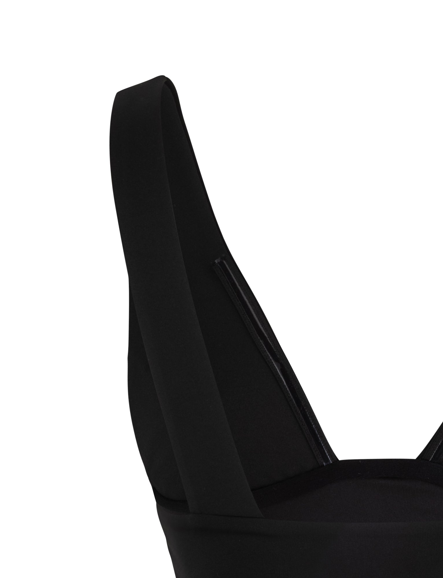 Close-up image of the LUNARIA TOP - BLACK from TIGERMIST featuring a V-neckline and wide shoulder straps. The focus is on the upper part of the top, highlighting the smooth, dark fabric and the sleek design of this stylish garment.