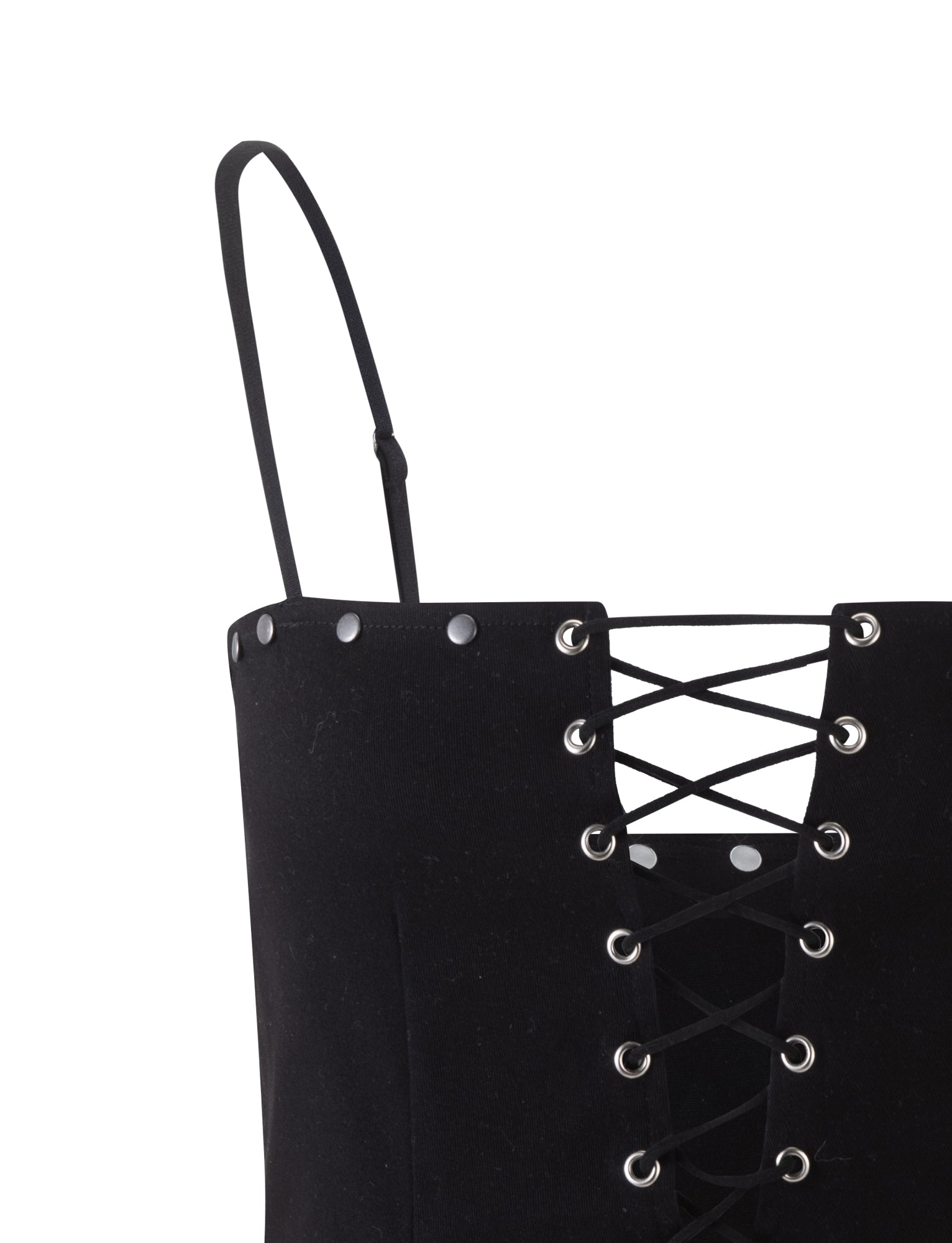 Close-up of the KERI TOP - BLACK by TIGERMIST, a corset-style top with thin shoulder straps. The front features a crisscross lace-up design with silver eyelets and studs along the sides. The fabric appears to be soft, complementing the intricate detailing.