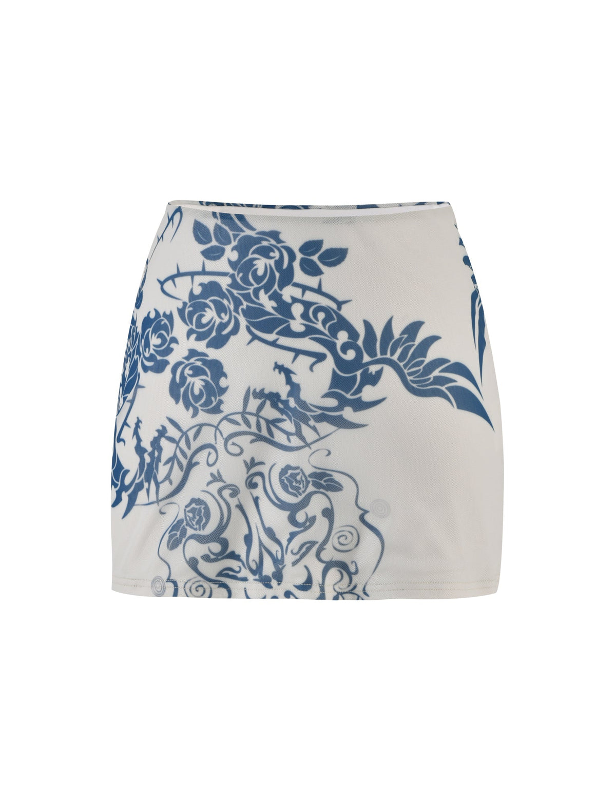 The FINOLA MESH MINI SKIRT - BLUE : TATTOO : TATTOO PRINT by TIGERMIST is a white mini skirt adorned with an intricate blue floral and nature-inspired design. The pattern showcases roses, leaves, and silhouettes of animals in various poses, prominently displayed on the front.