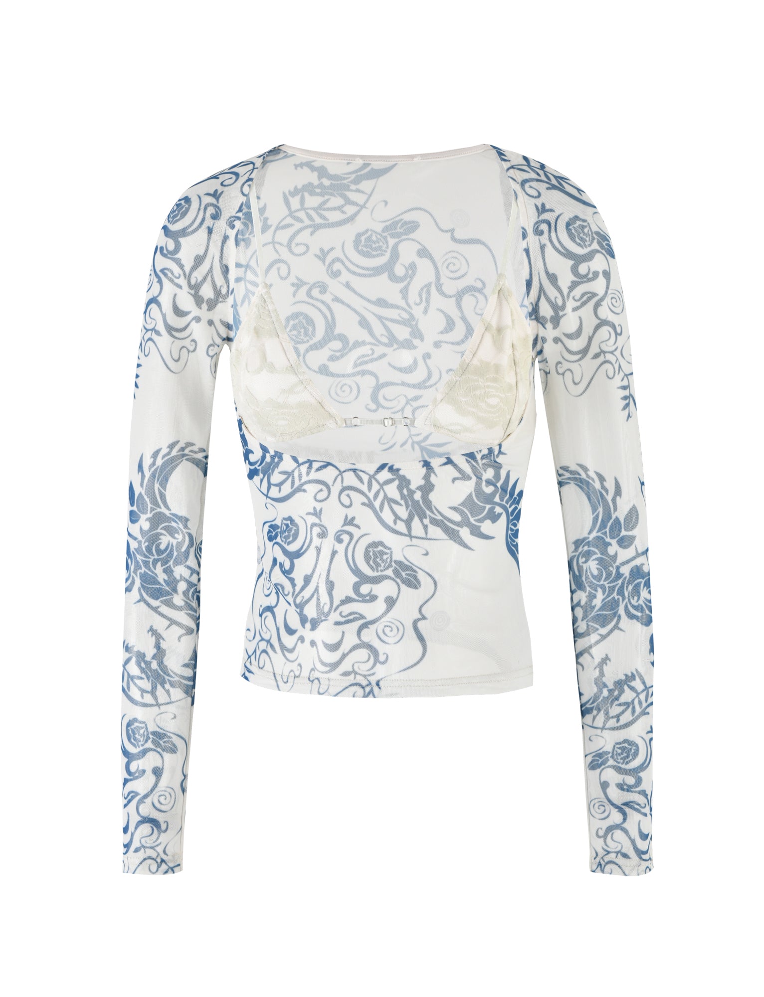 The CHRISTY MESH LONG SLEEVE TOP - BLUE : TATTOO : TATTOO PRINT from TIGERMIST features a low neckline and elegant blue baroque patterns on a white background. The sheer top partially reveals a white bra underneath, with both the front and back showcasing its intricate design. The material is delicate yet stylish, making it a standout piece.