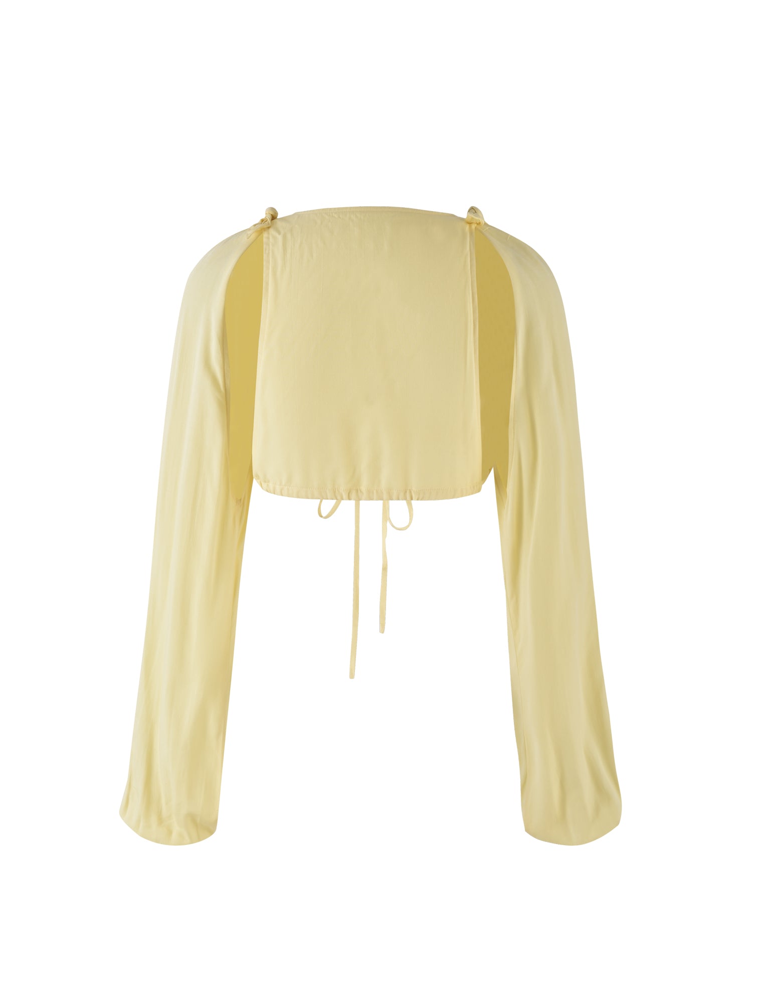 The PHILLIPA TOP - YELLOW : LEMON by TIGERMIST is a light yellow, long-sleeved crop top with an off-the-shoulder design, featuring cut-out sections on the shoulders and a tie-string detail at the back.